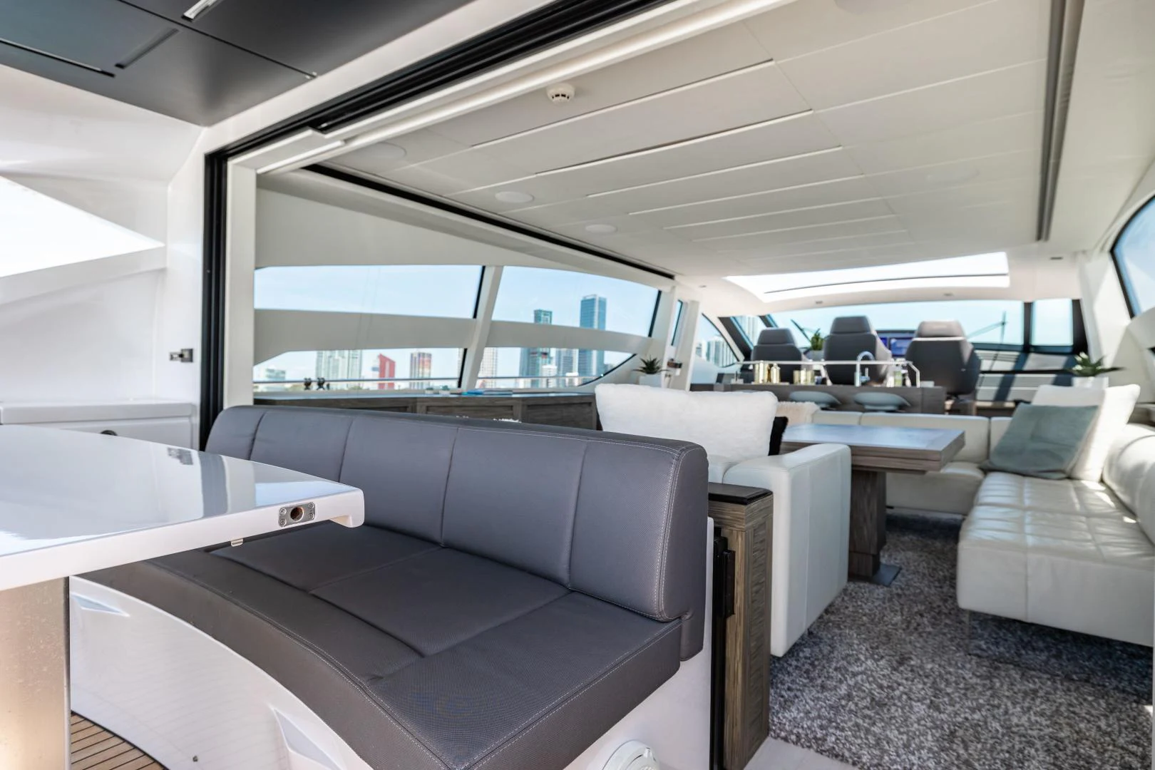 a room with couches and a table aboard DOUBLE OR NOTHING Yacht for Sale