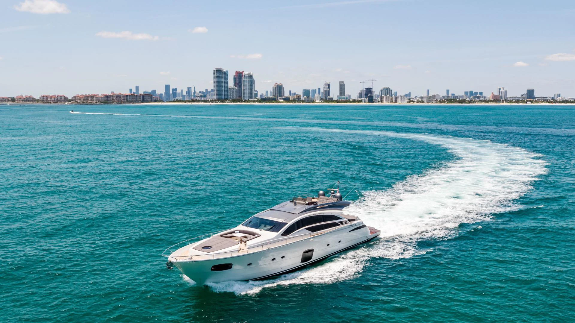 a white yacht on the water aboard DOUBLE OR NOTHING Yacht for Sale