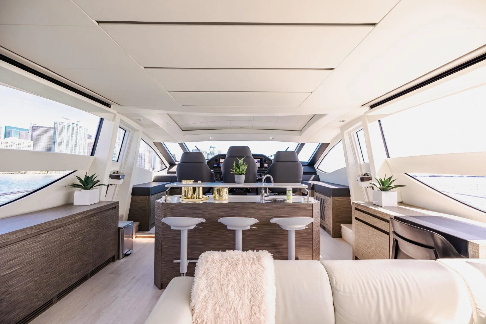 inside of a vehicle with a table and chairs and a window aboard DOUBLE OR NOTHING Yacht for Sale