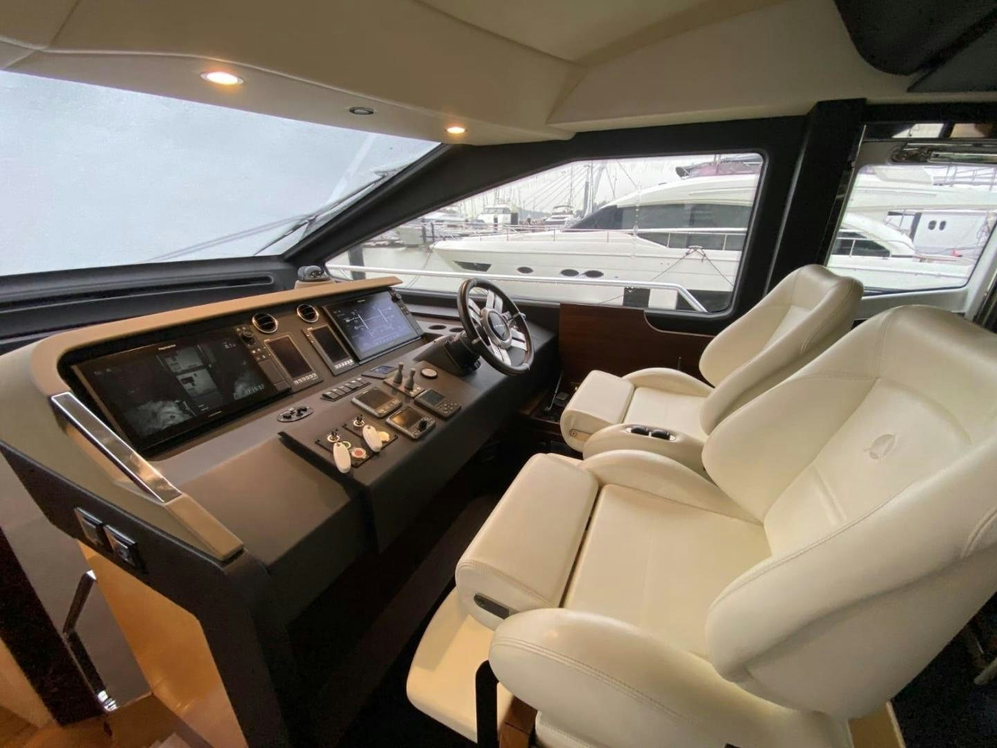 inside of a car aboard PASEO Yacht for Sale