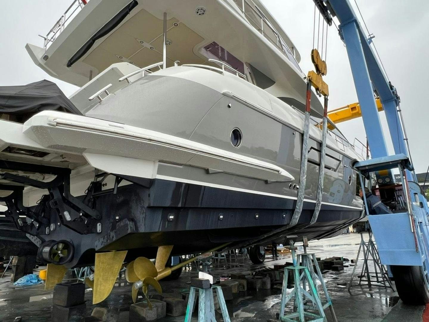 a large white boat with a large white ship on it aboard PASEO Yacht for Sale