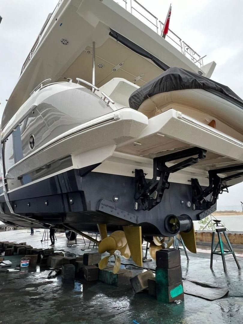 a large military ship aboard PASEO Yacht for Sale