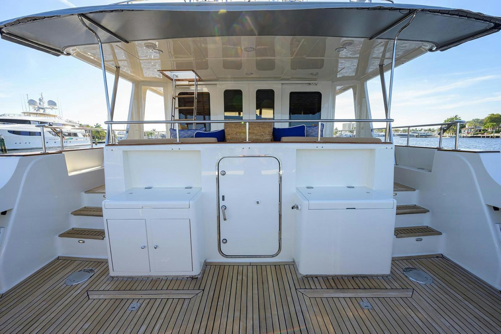 a large white building with many doors aboard HARD TIMES NAME RESERVED Yacht for Sale