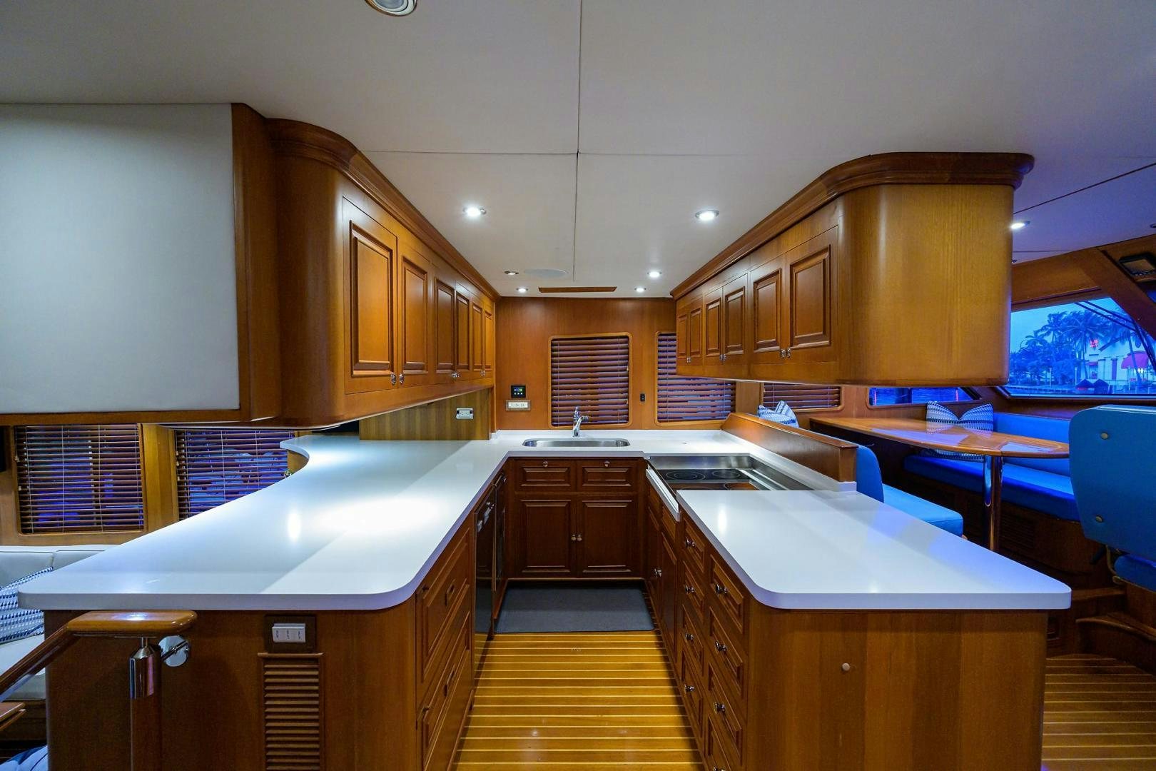a kitchen with wooden cabinets aboard HARD TIMES NAME RESERVED Yacht for Sale