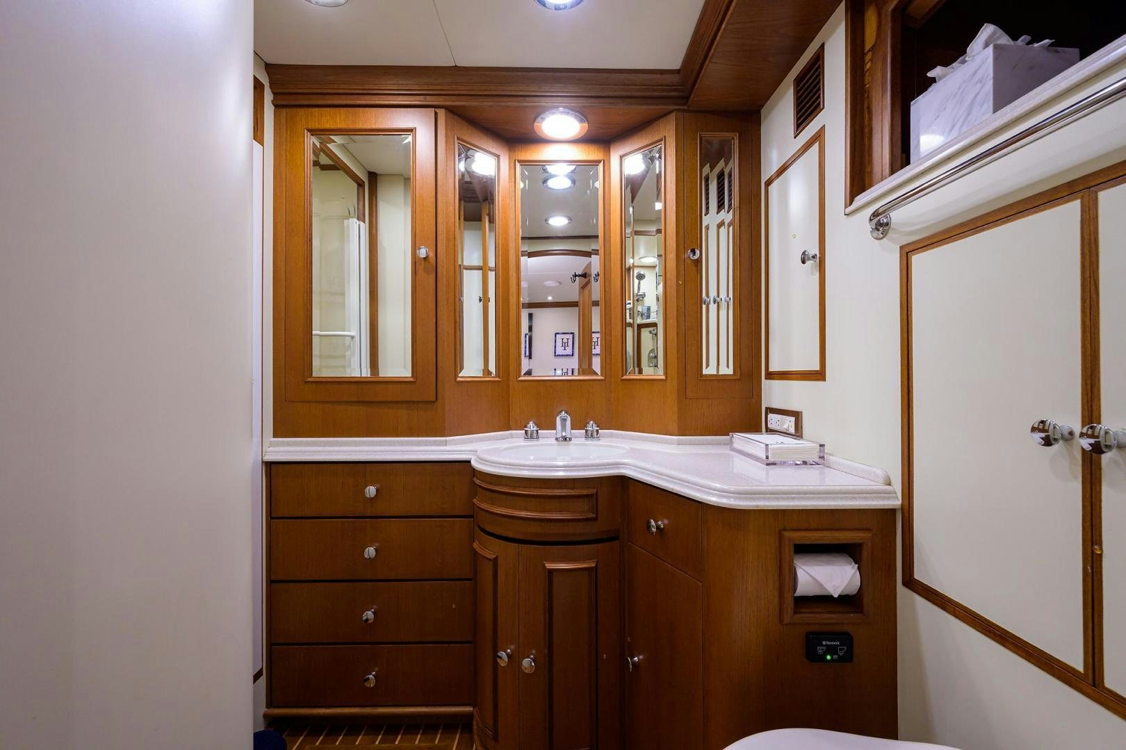a bathroom with a sink and cabinets aboard HARD TIMES NAME RESERVED Yacht for Sale