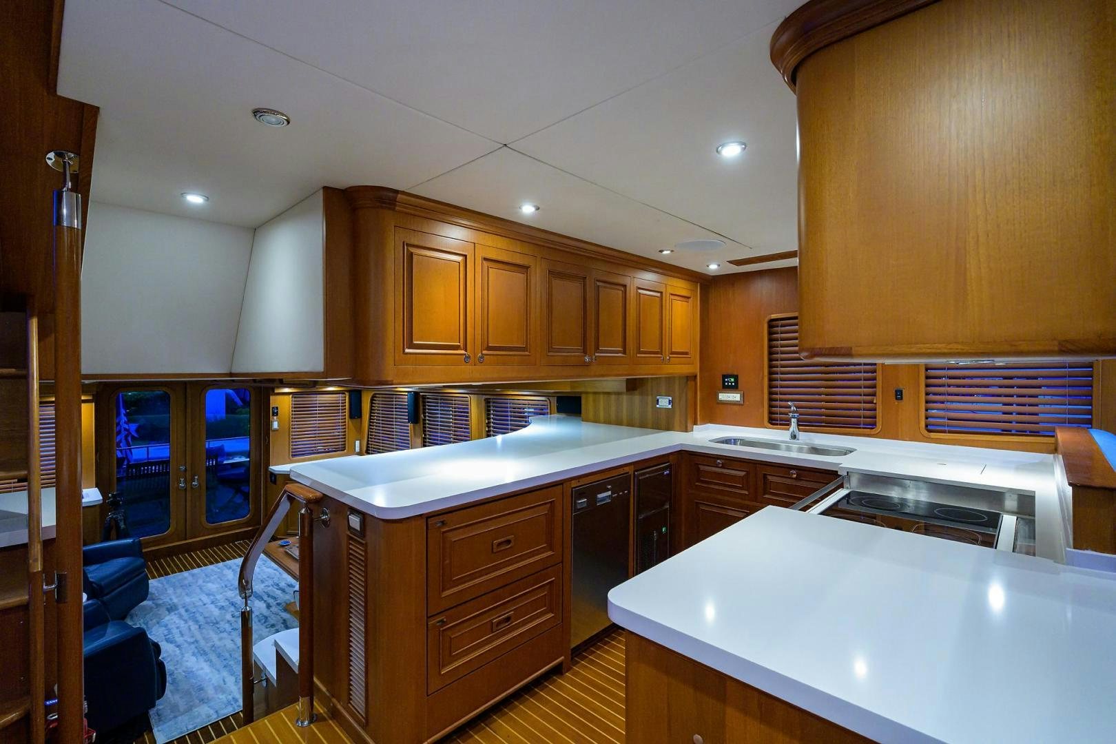 a kitchen with wooden cabinets aboard HARD TIMES NAME RESERVED Yacht for Sale