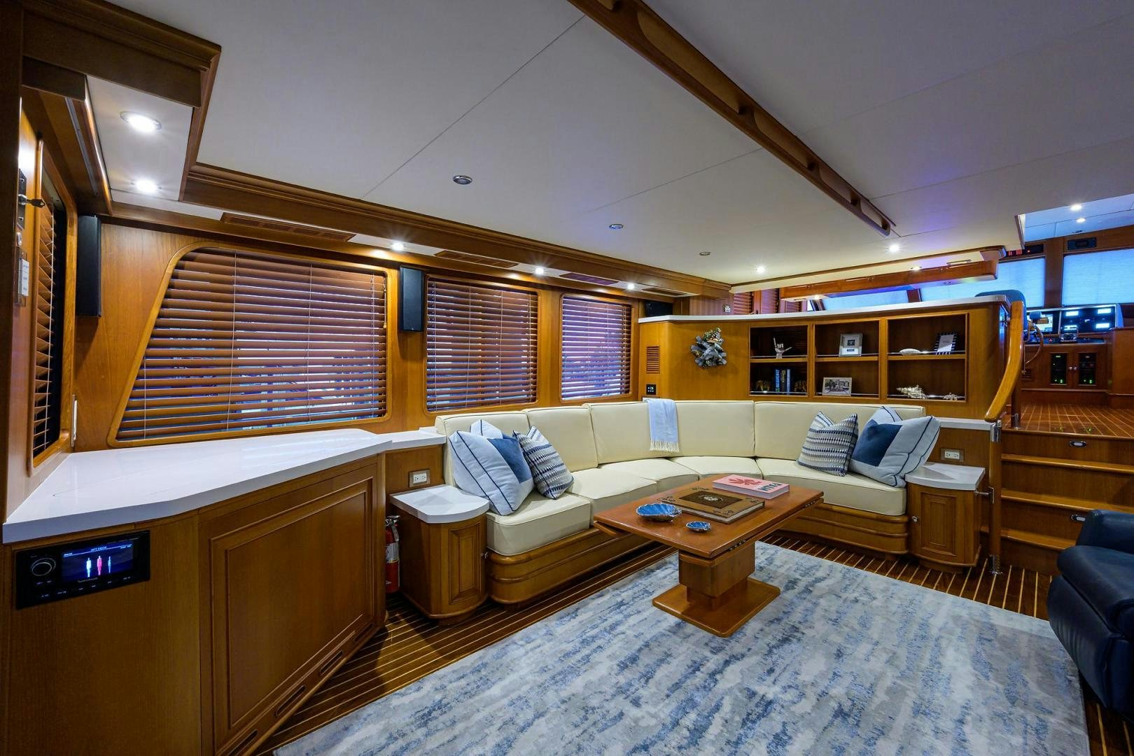 a room with a couch and a table aboard HARD TIMES NAME RESERVED Yacht for Sale