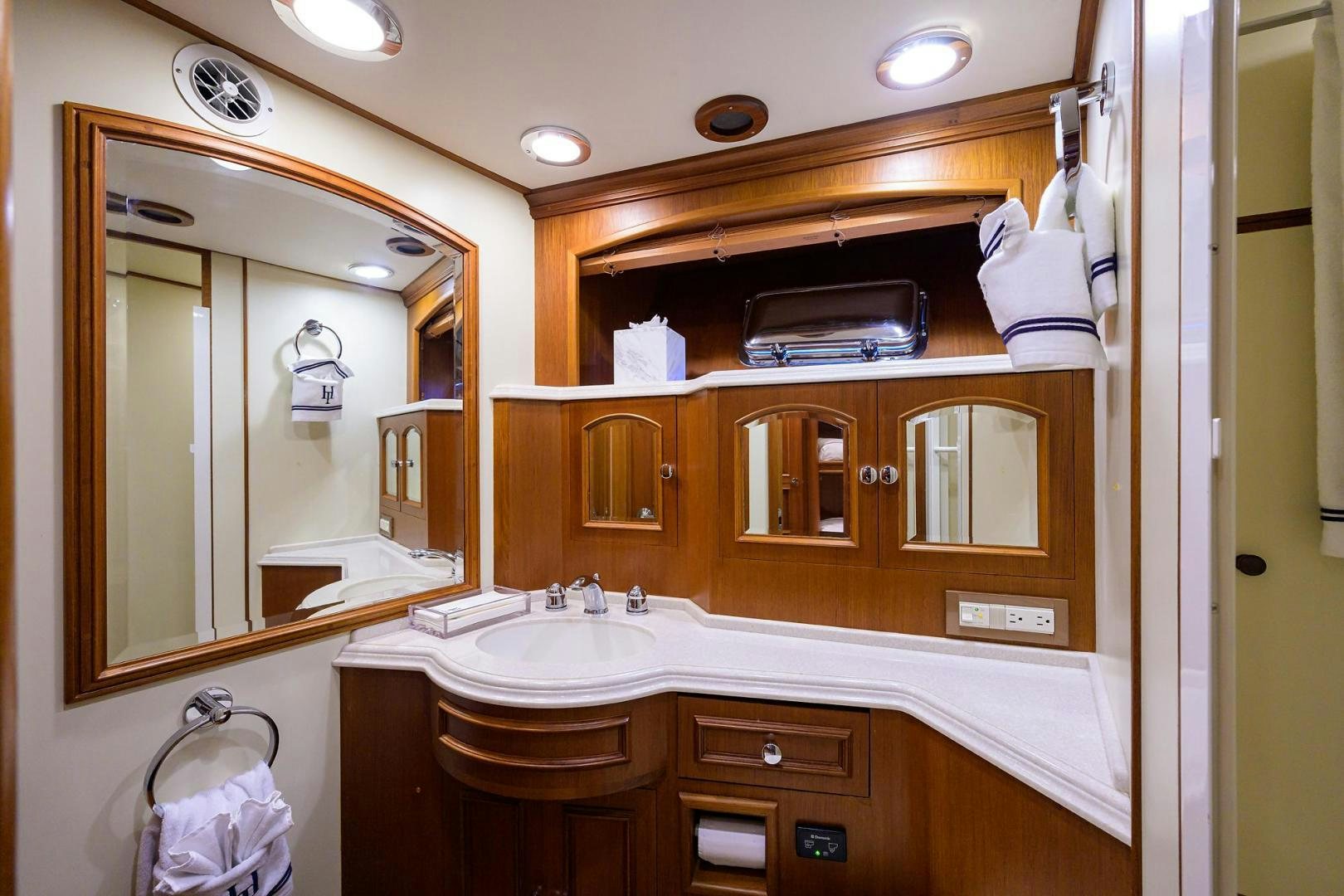 a bathroom with a large mirror aboard HARD TIMES NAME RESERVED Yacht for Sale