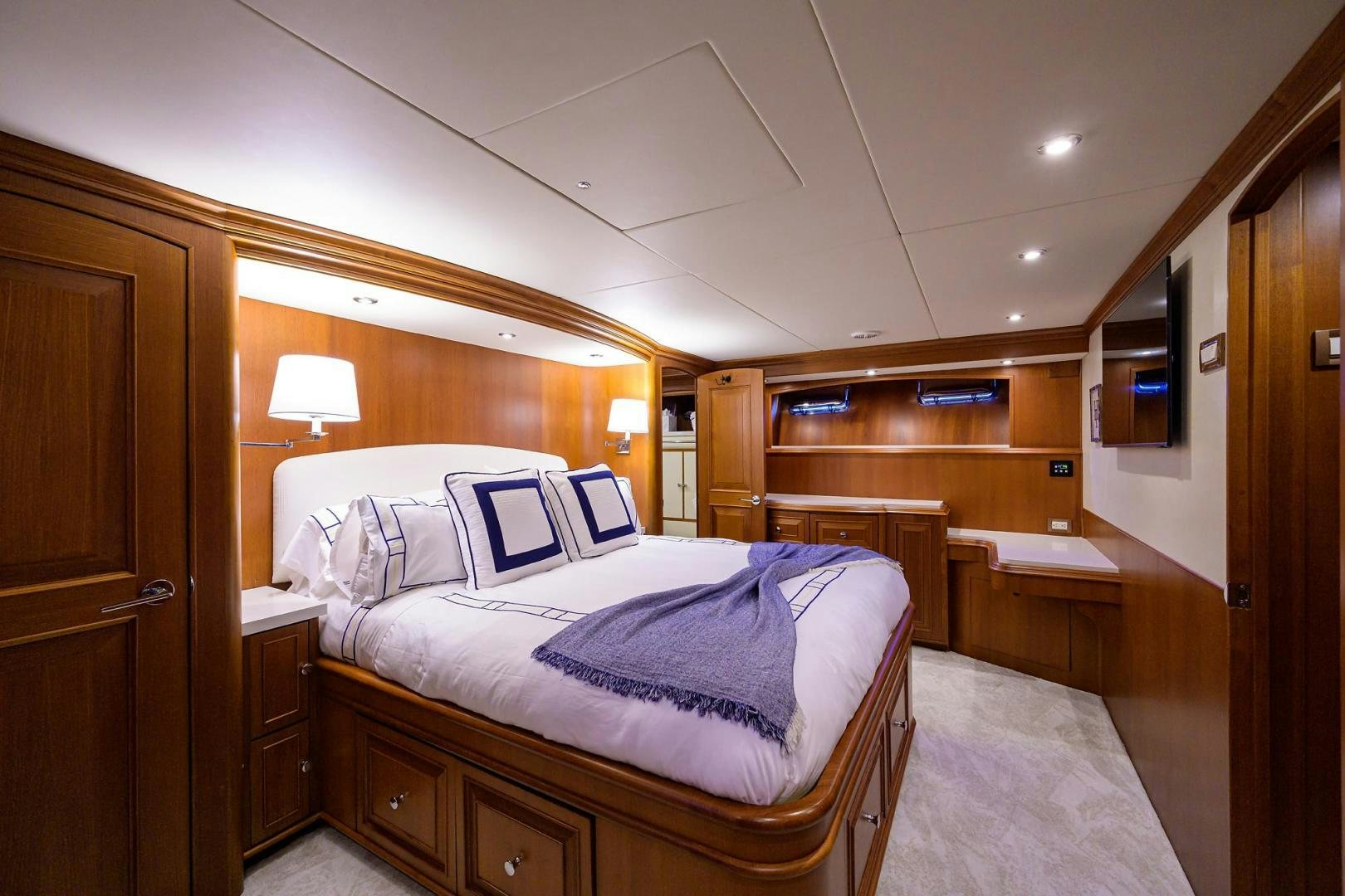 a room with a bed and a wood door aboard HARD TIMES NAME RESERVED Yacht for Sale