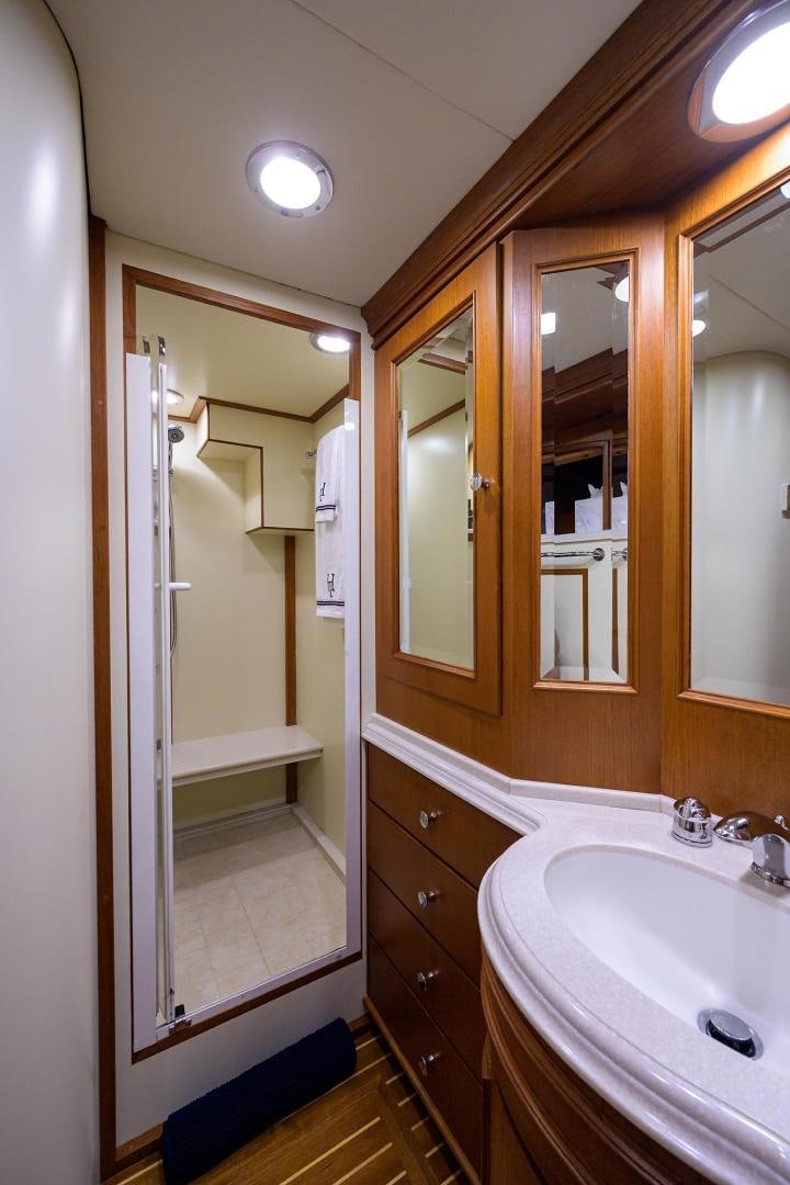 a bathroom with a sink and a mirror aboard HARD TIMES NAME RESERVED Yacht for Sale