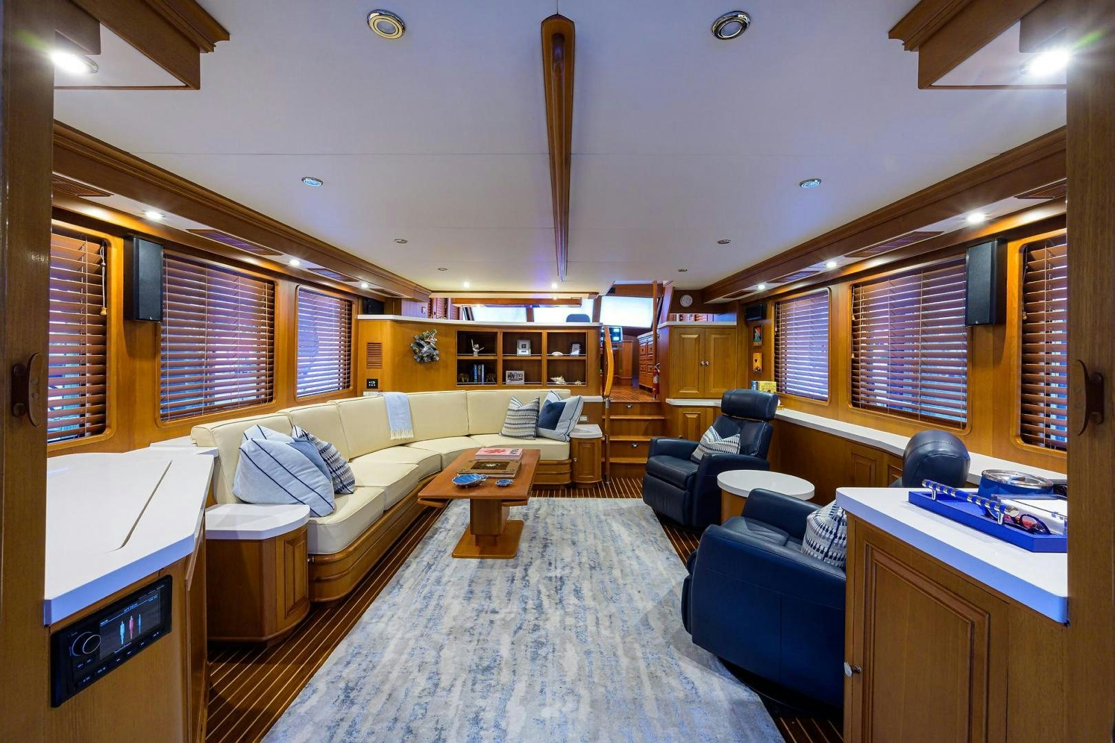 a living room with a couch and a table aboard HARD TIMES NAME RESERVED Yacht for Sale