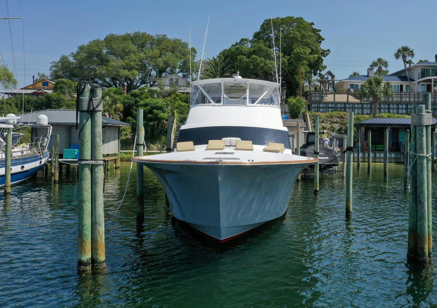 a boat docked at a pier aboard BIG ENOS Yacht for Sale