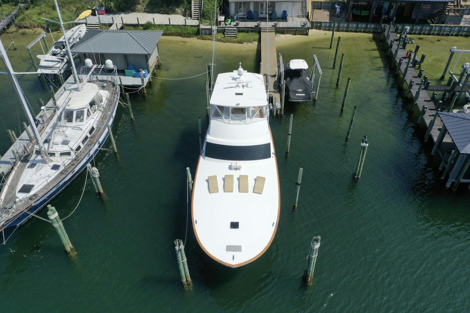 a boat is parked in the water aboard BIG ENOS Yacht for Sale