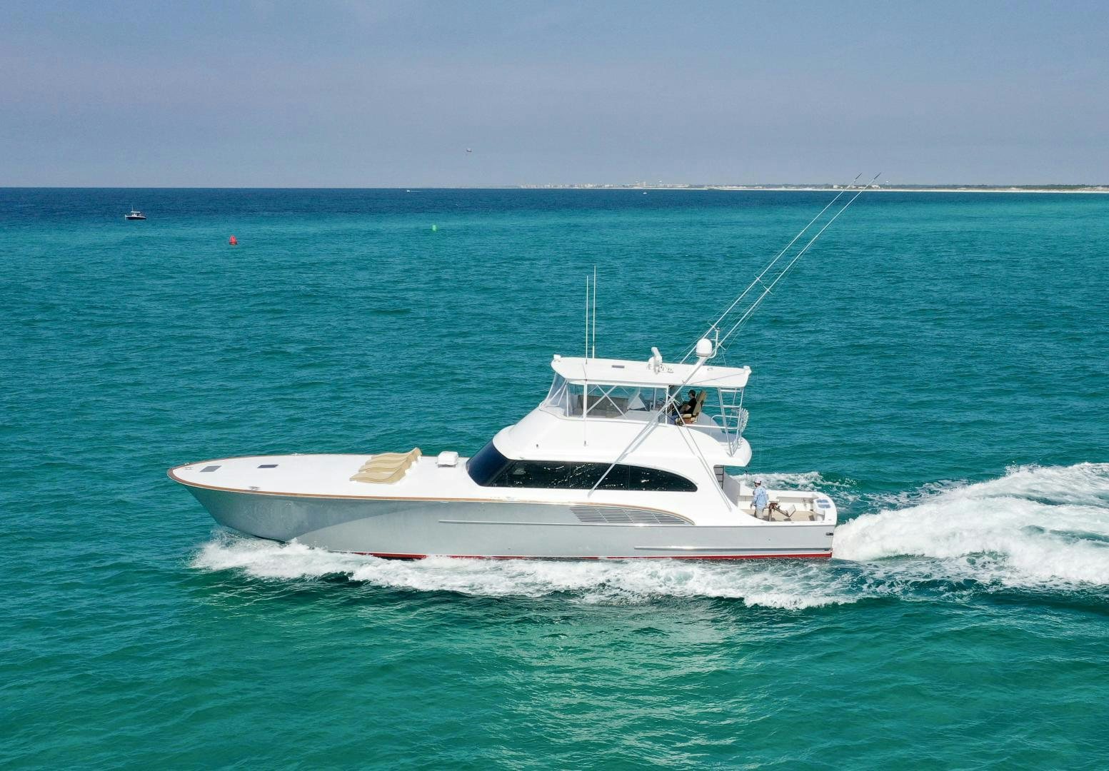 a white boat in the water aboard BIG ENOS Yacht for Sale