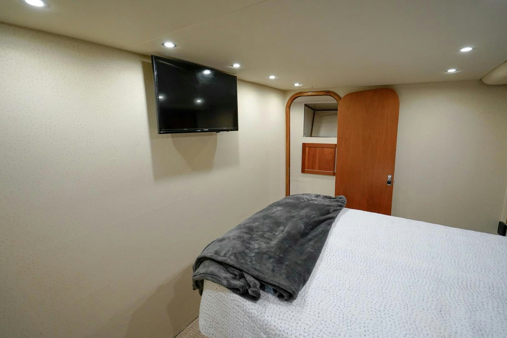 a bed in a room aboard BIG ENOS Yacht for Sale