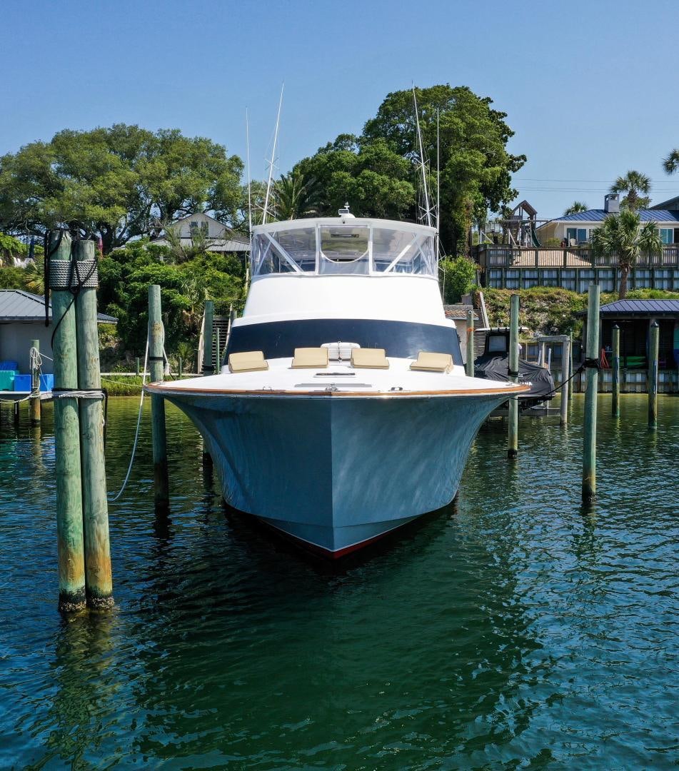 a boat docked at a pier aboard BIG ENOS Yacht for Sale