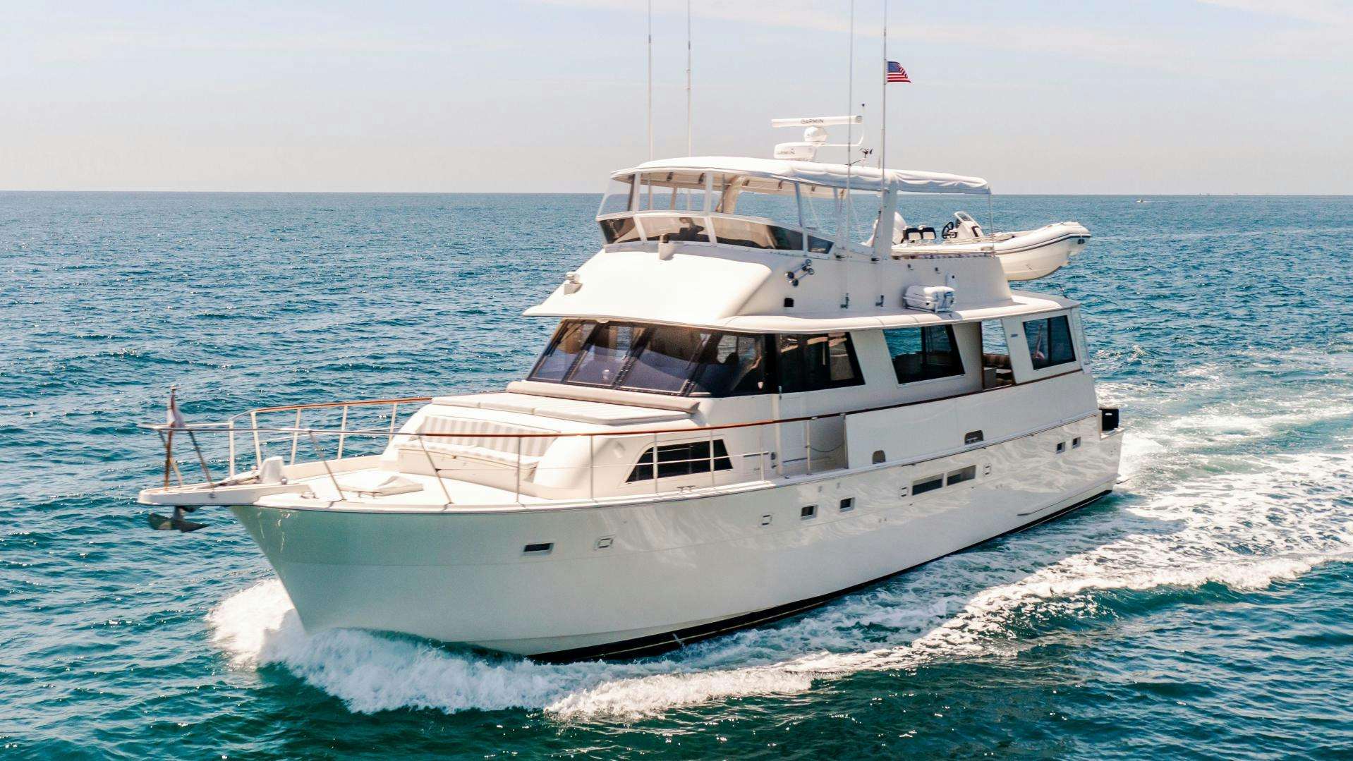 a white boat on the water aboard SOULMATE Yacht for Sale