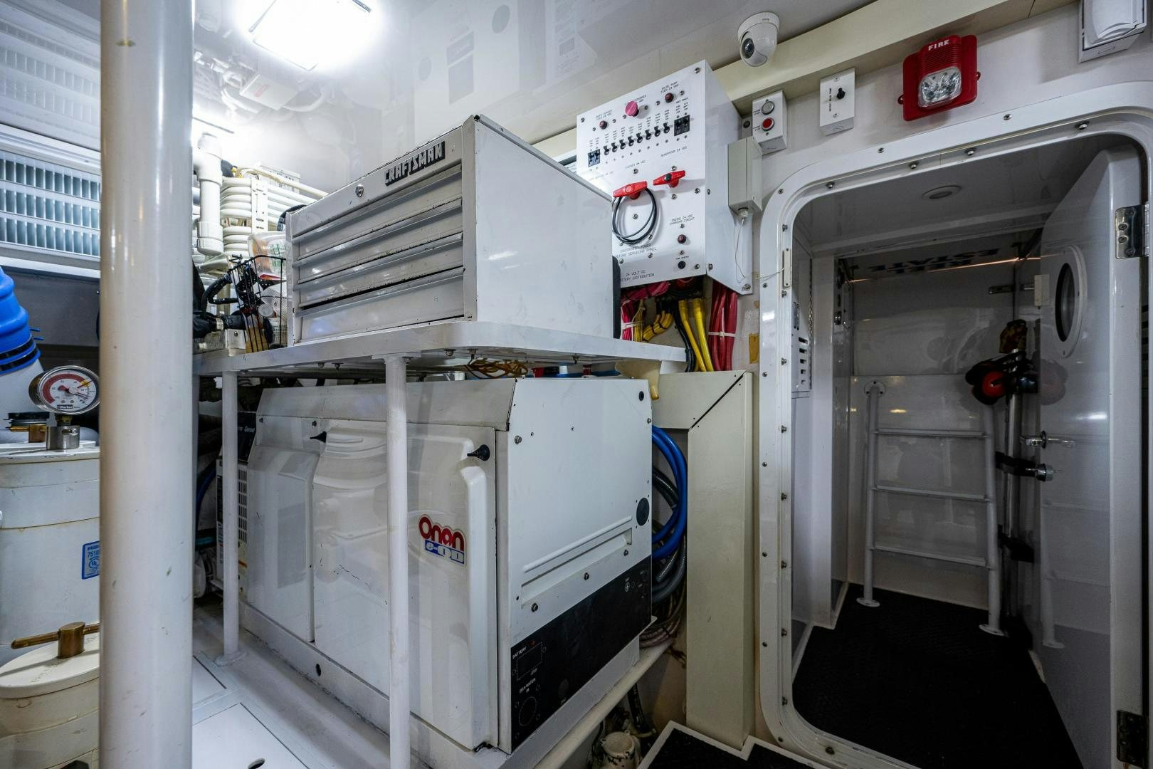 a large white machine aboard REEL ESTATE Yacht for Sale