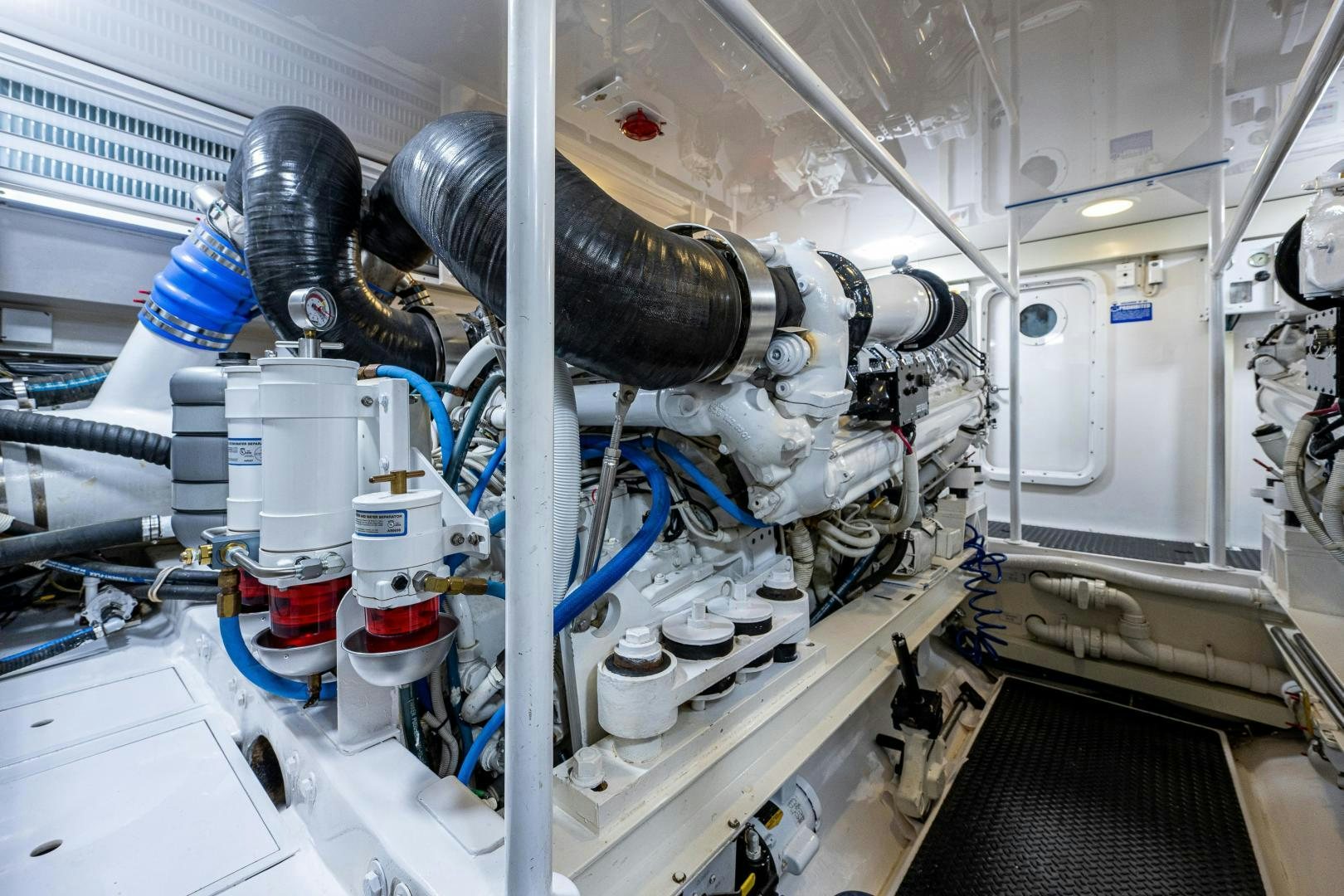 a machine with a large metal cylinder aboard REEL ESTATE Yacht for Sale