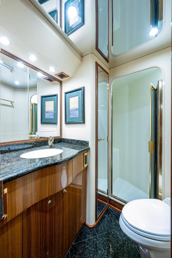 a bathroom with a marble counter top aboard REEL ESTATE Yacht for Sale