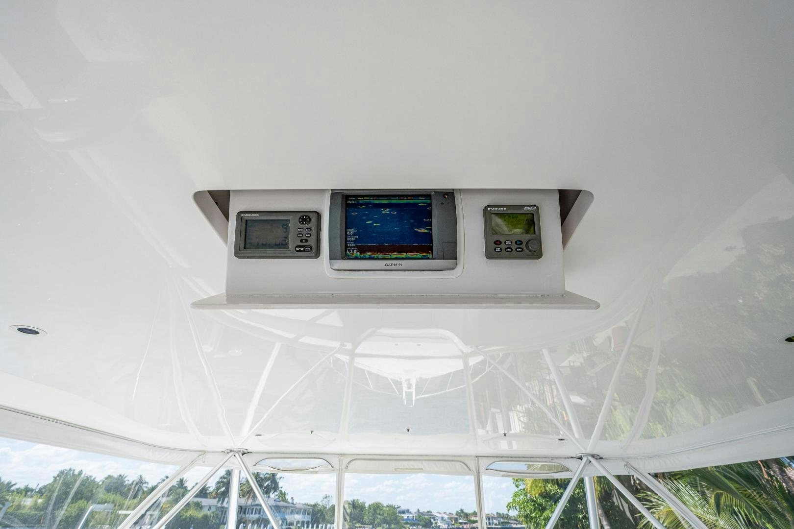 a white microwave on a white wall aboard REEL ESTATE Yacht for Sale