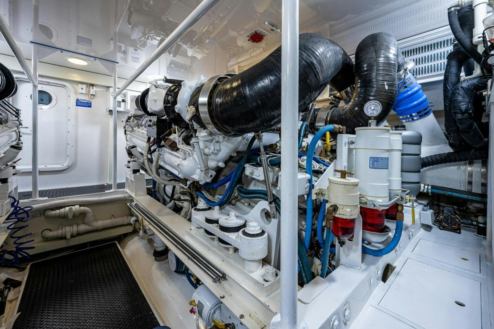 a machine with a large metal cylinder aboard REEL ESTATE Yacht for Sale