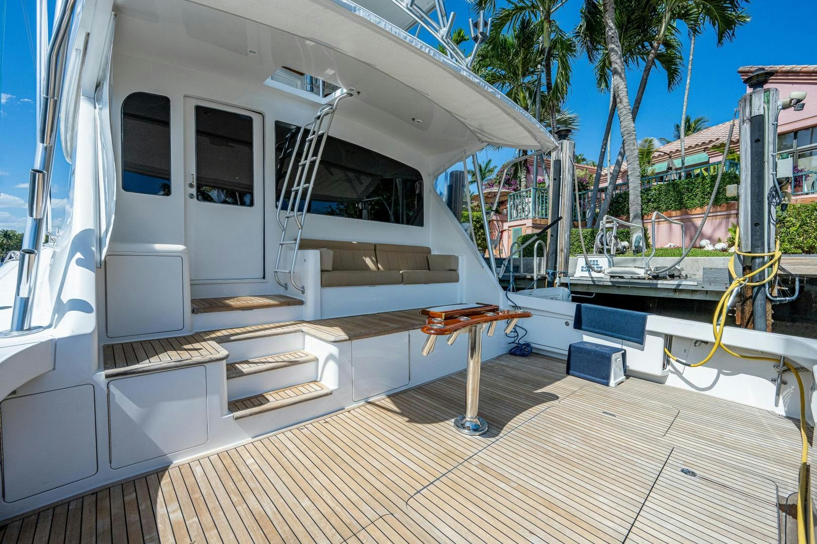 a deck with a deck and a ladder aboard REEL ESTATE Yacht for Sale