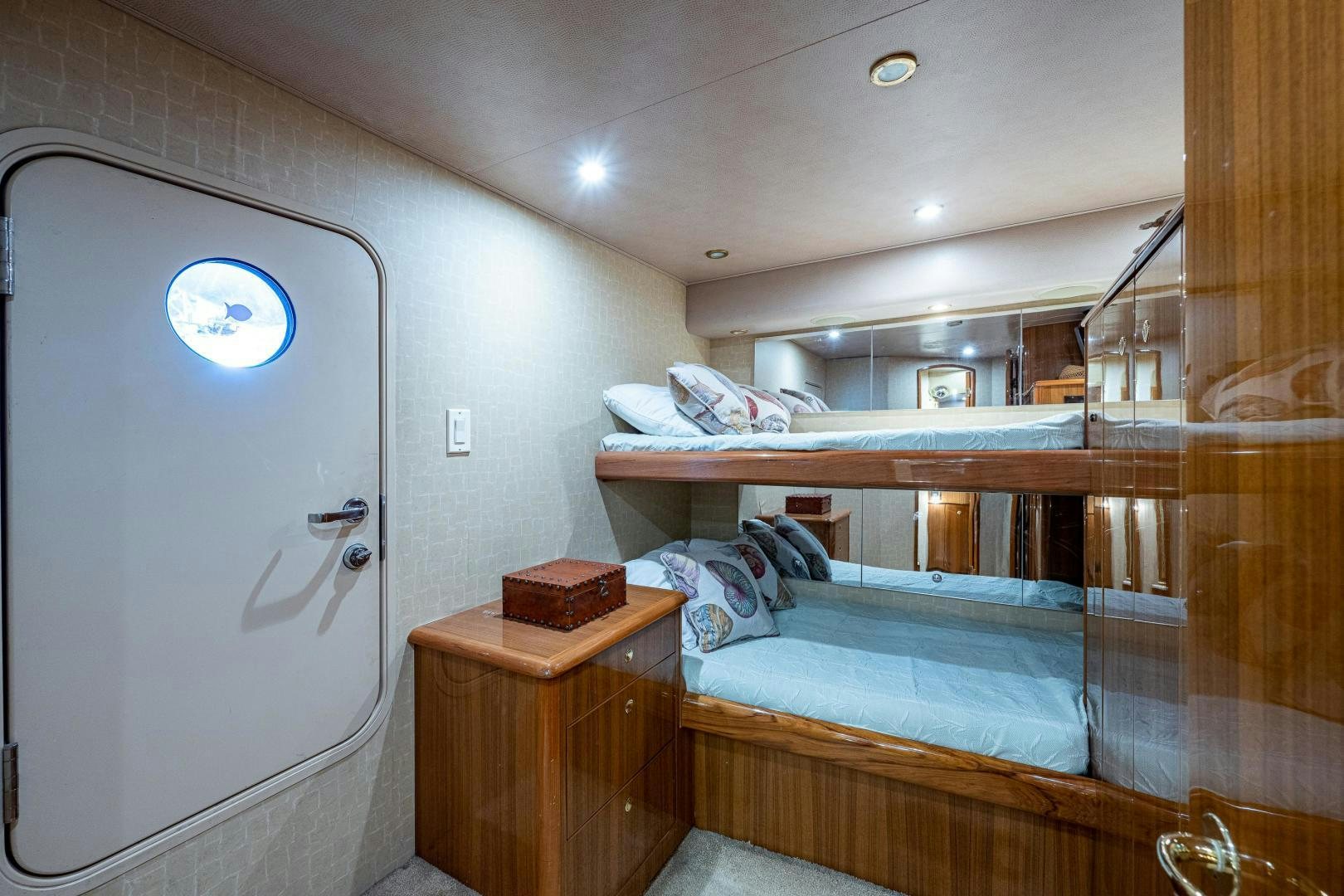 a room with bunk beds aboard REEL ESTATE Yacht for Sale