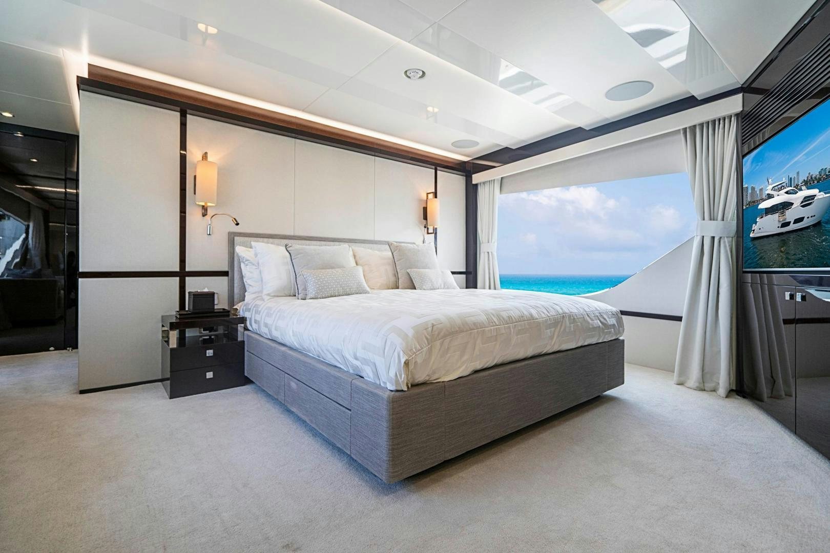 a large bedroom with a large bed aboard QUANTUM Yacht for Sale
