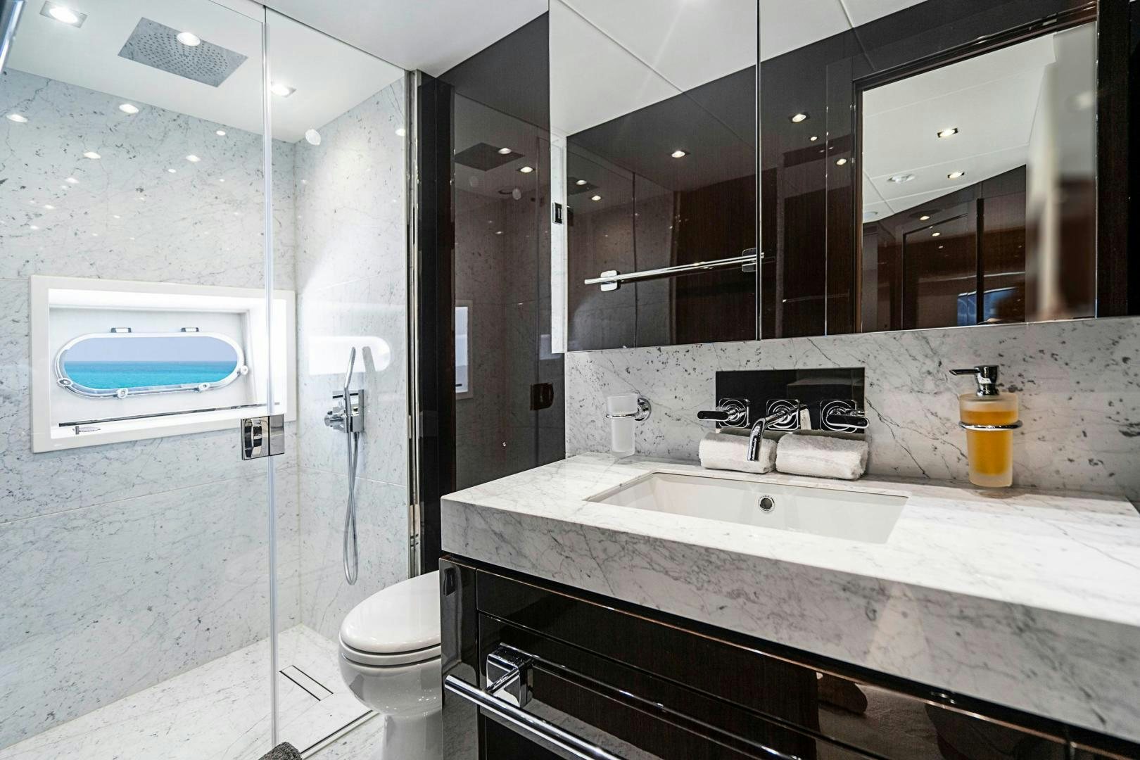 a bathroom with a sink and a toilet aboard QUANTUM Yacht for Sale