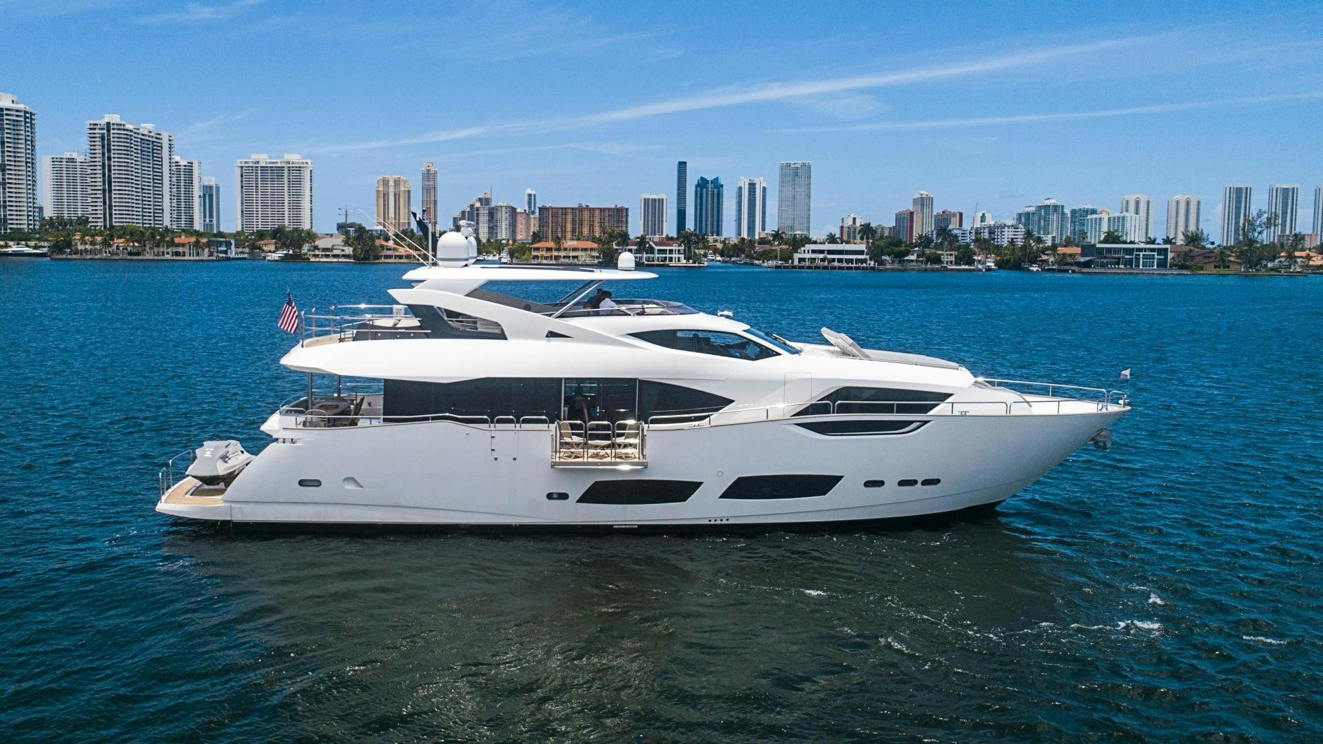 a white yacht in the water aboard QUANTUM Yacht for Sale