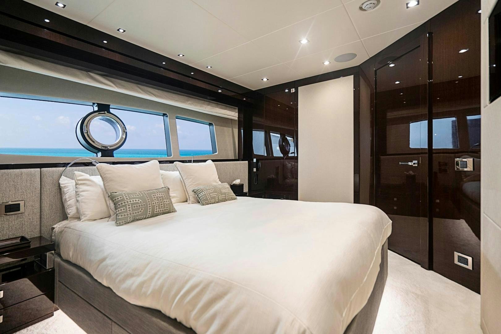 a bed in a room aboard QUANTUM Yacht for Sale