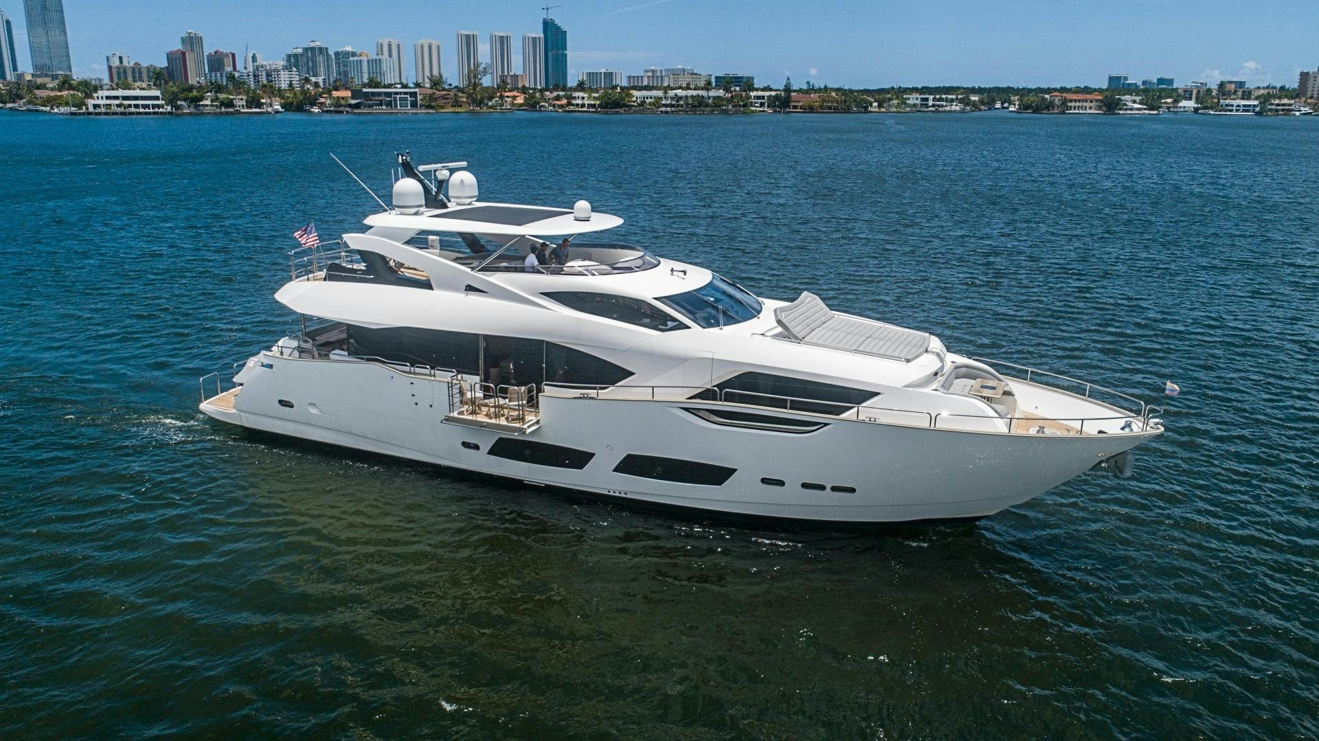 a white yacht on the water aboard QUANTUM Yacht for Sale
