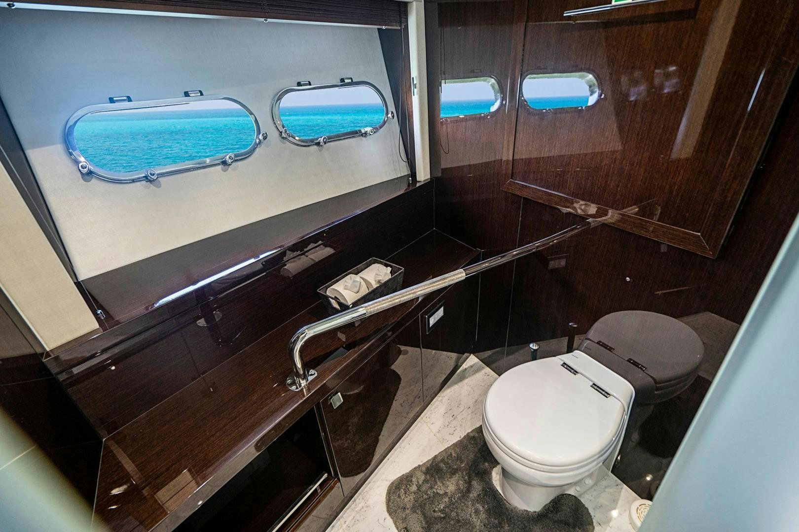 a bathroom with a glass shower aboard QUANTUM Yacht for Sale