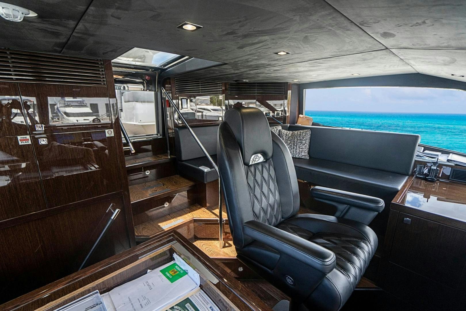 a bus with seats and a bench aboard QUANTUM Yacht for Sale