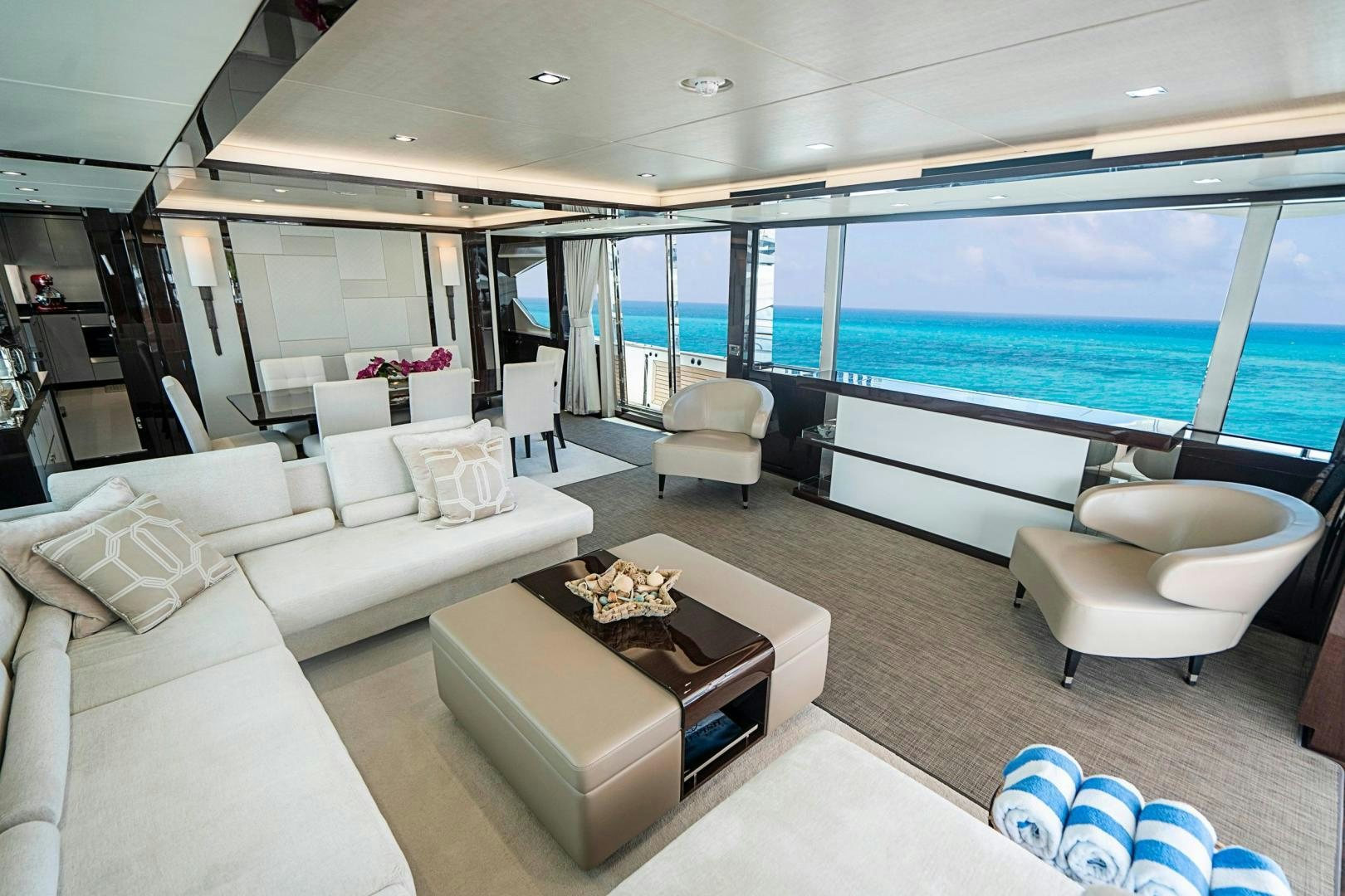 a living room with a large window aboard QUANTUM Yacht for Sale