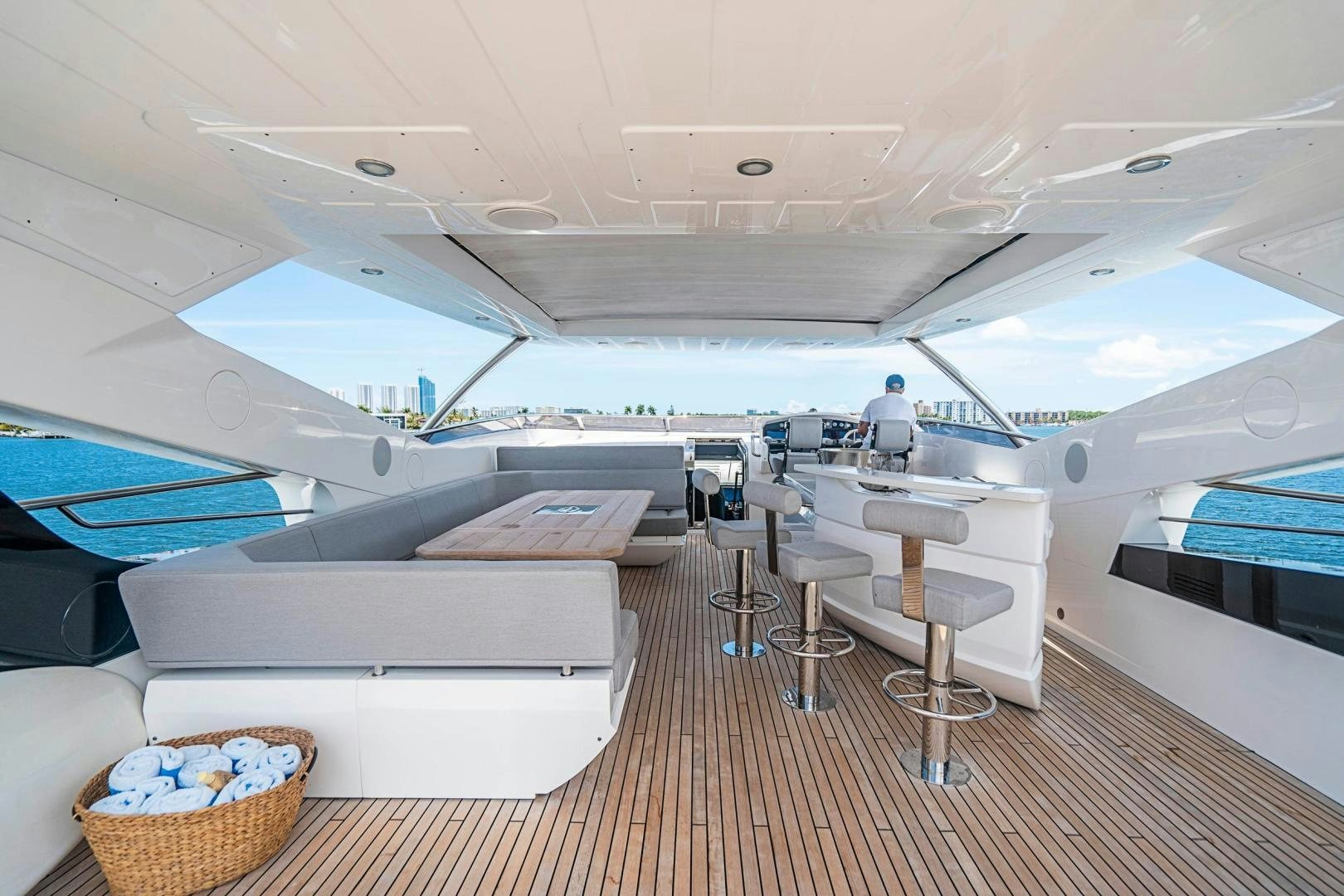 a boat with tables and chairs aboard QUANTUM Yacht for Sale