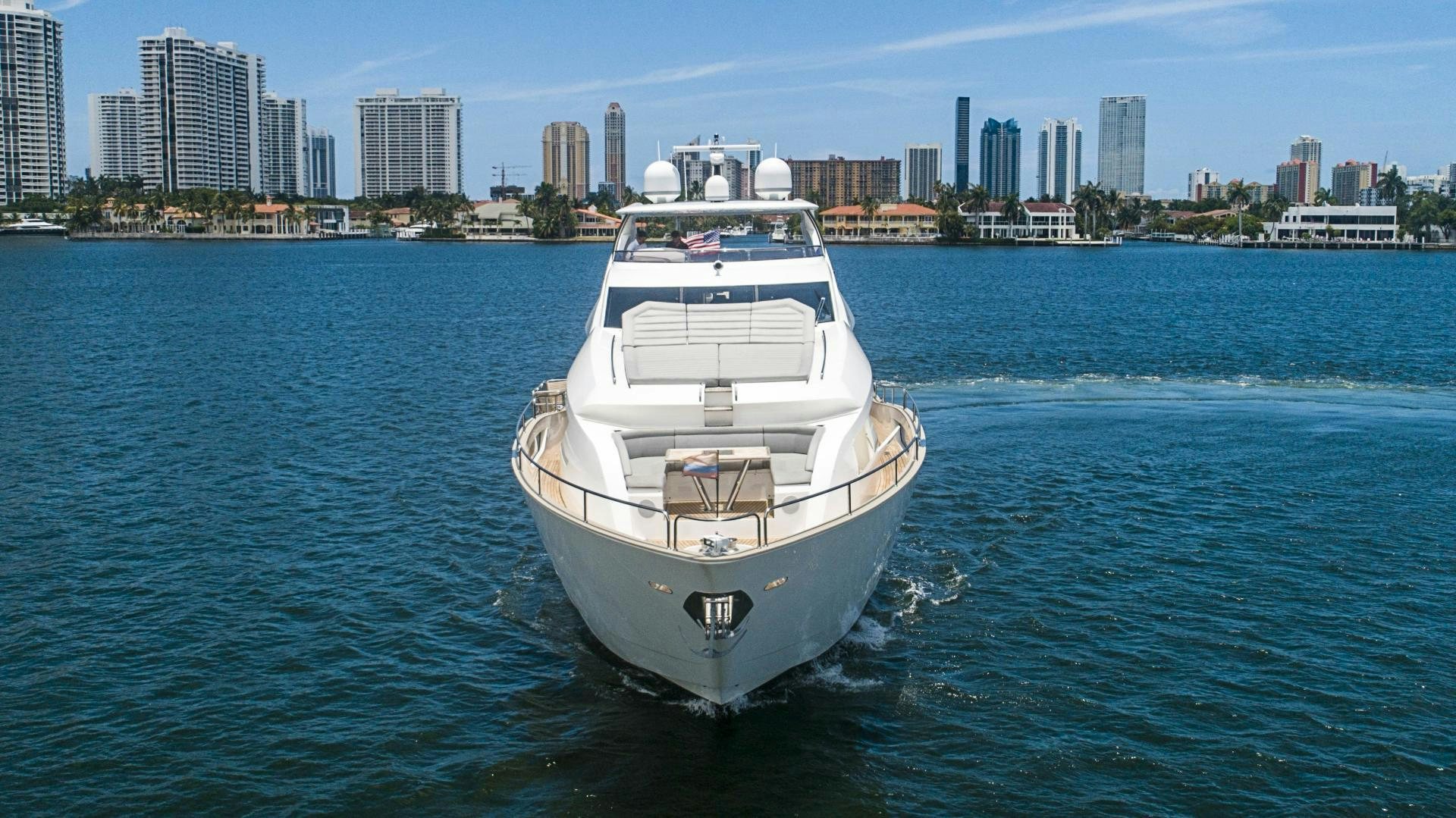 a white boat in the water aboard QUANTUM Yacht for Sale