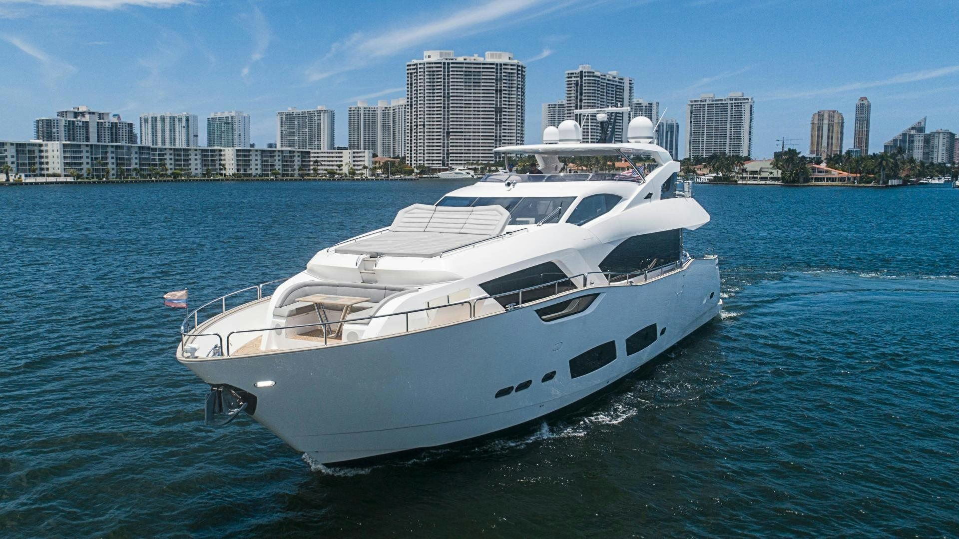 a white yacht in the water aboard QUANTUM Yacht for Sale