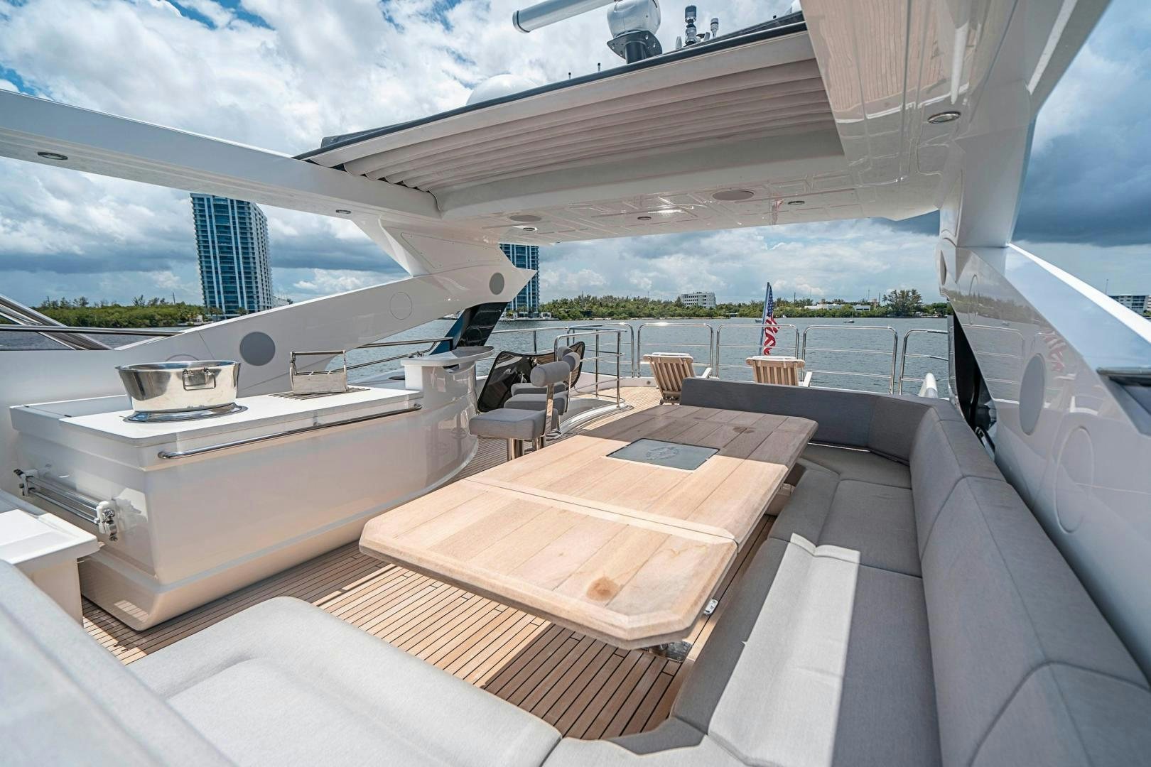a room with a table and chairs aboard QUANTUM Yacht for Sale