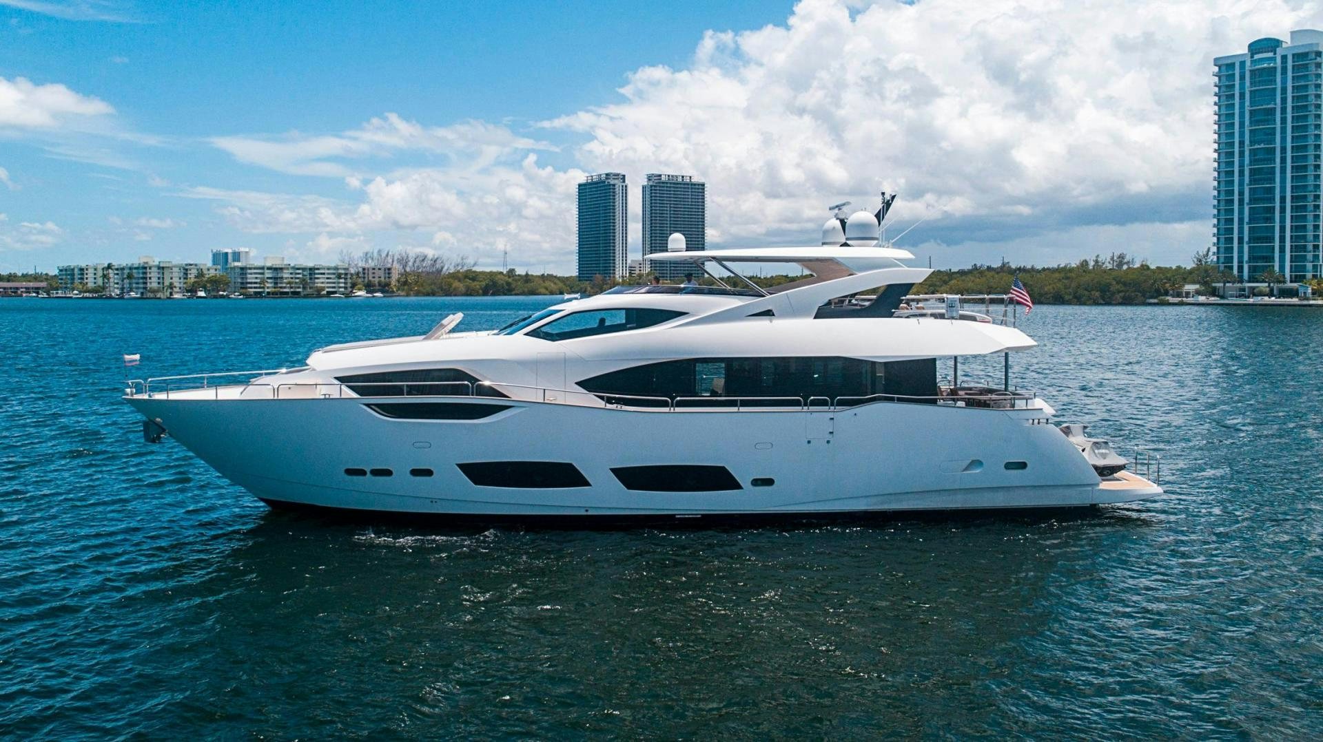 a white yacht in the water aboard QUANTUM Yacht for Sale