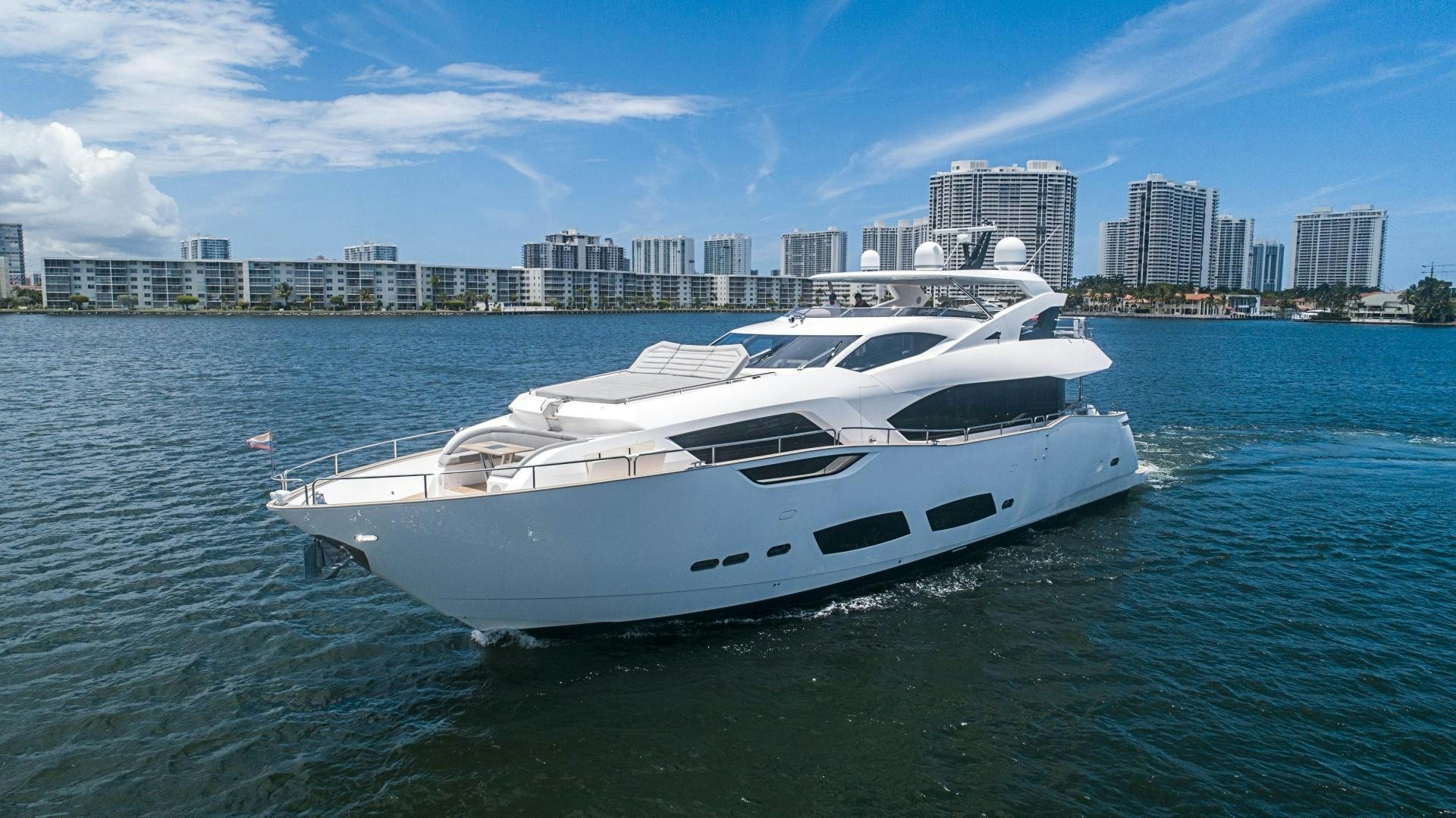 a white yacht in the water aboard QUANTUM Yacht for Sale