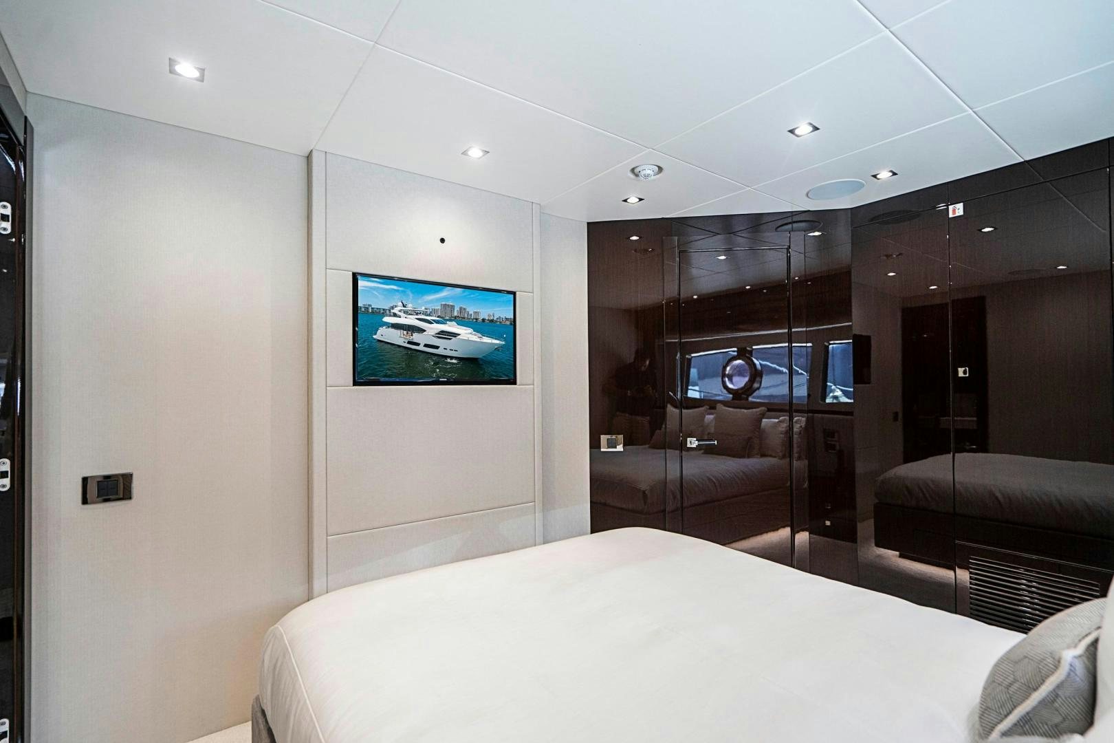 a hotel room with a bed aboard QUANTUM Yacht for Sale