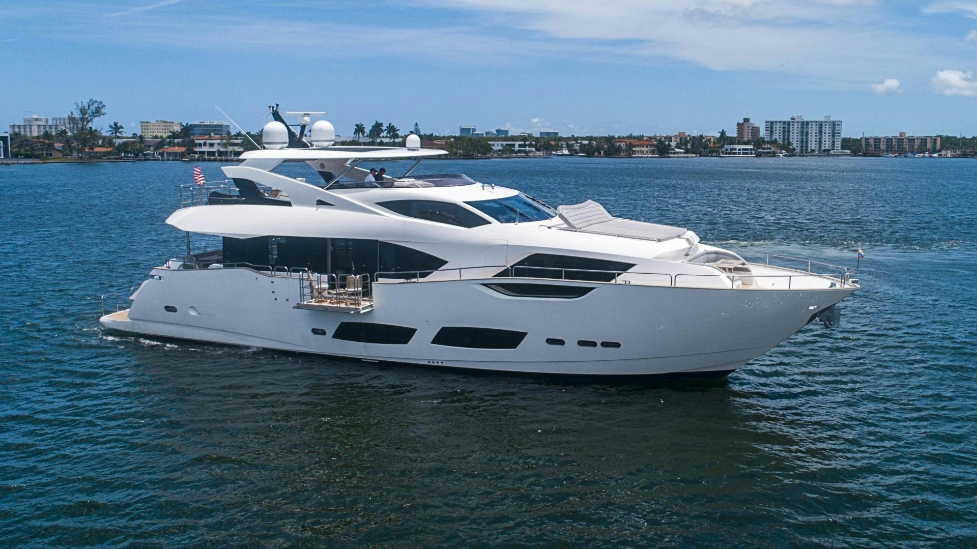 a white yacht in the water aboard QUANTUM Yacht for Sale