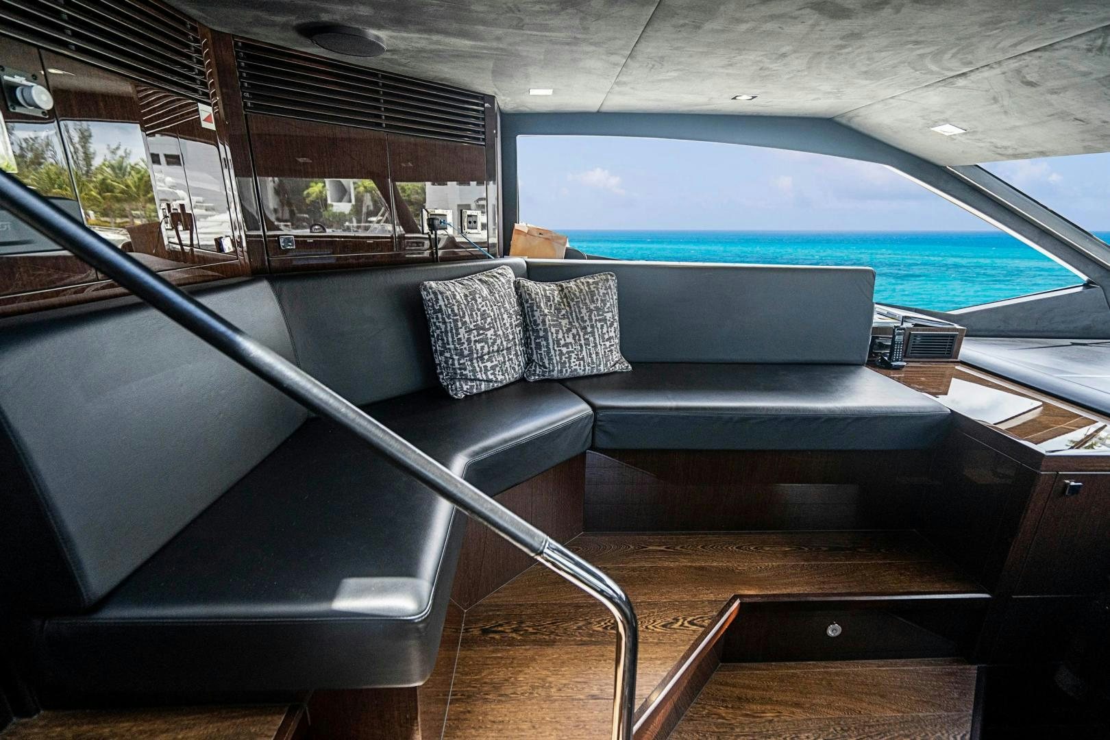 a car with a seat and a bench in the back aboard QUANTUM Yacht for Sale