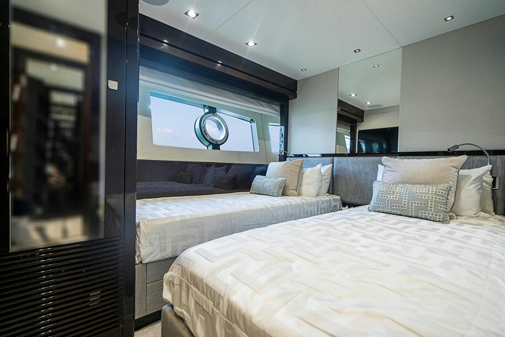a room with two beds aboard QUANTUM Yacht for Sale