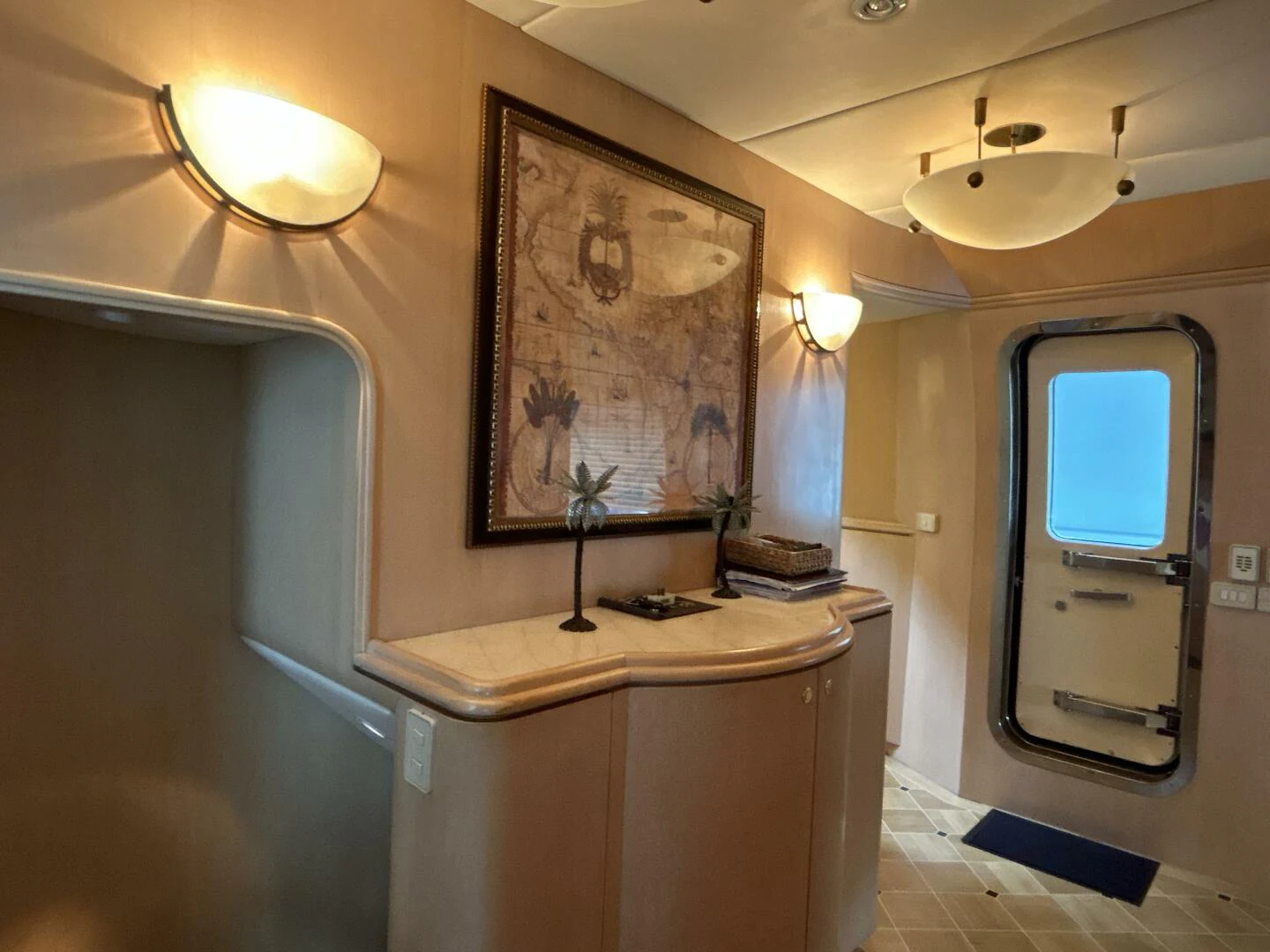 a room with a desk and a mirror aboard MARGAUX Yacht for Sale
