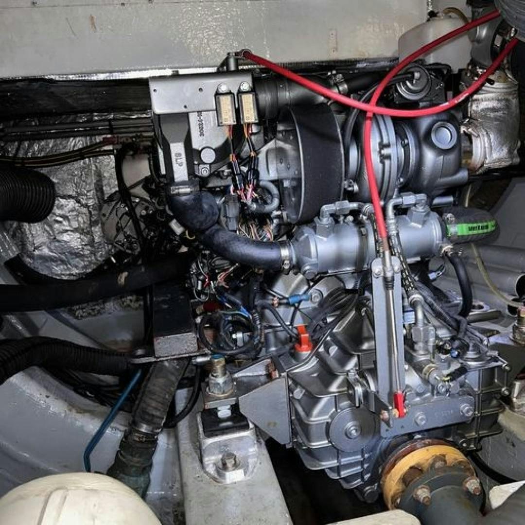 a car engine with a red and blue engine aboard MATAU Yacht for Sale