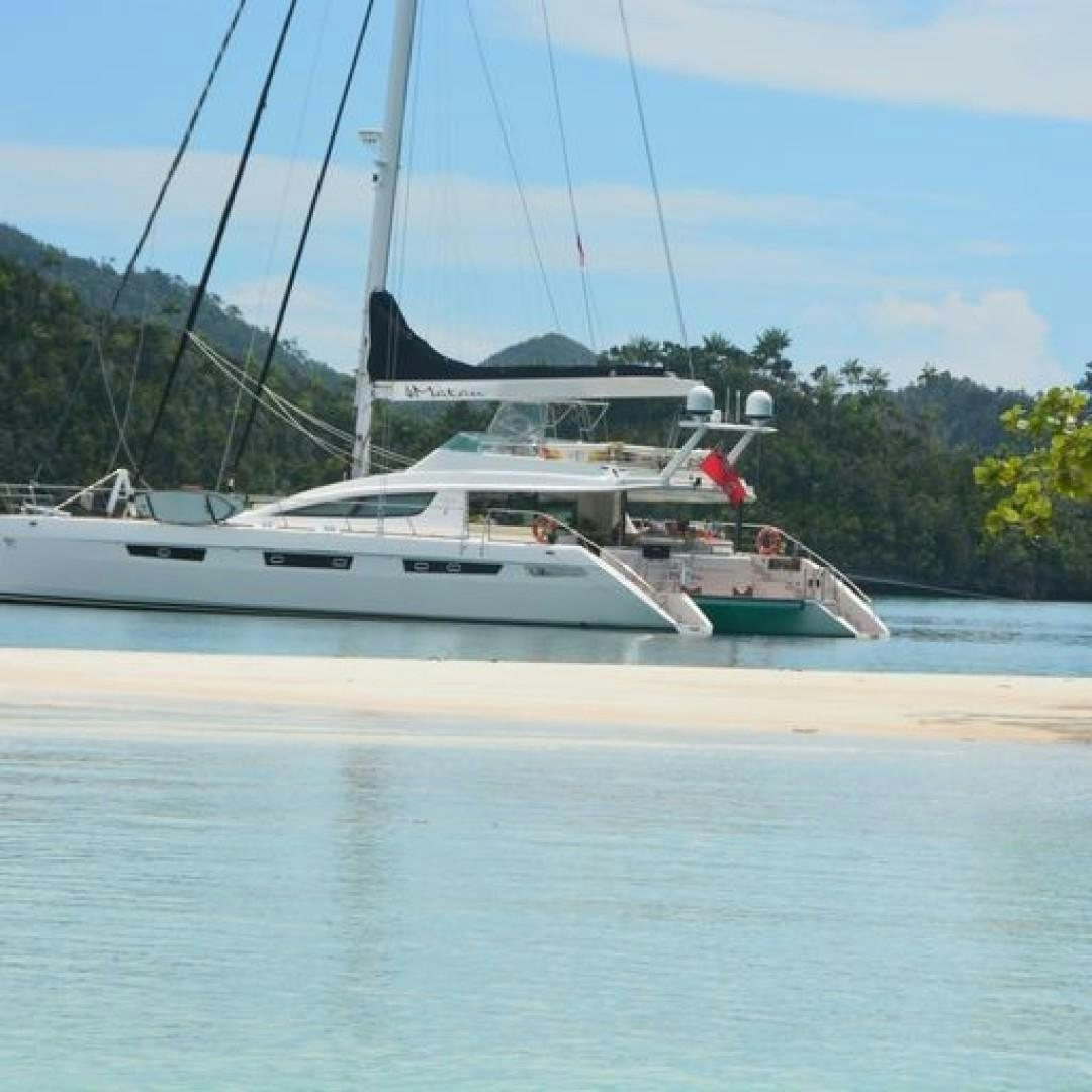 a boat on the water aboard MATAU Yacht for Sale