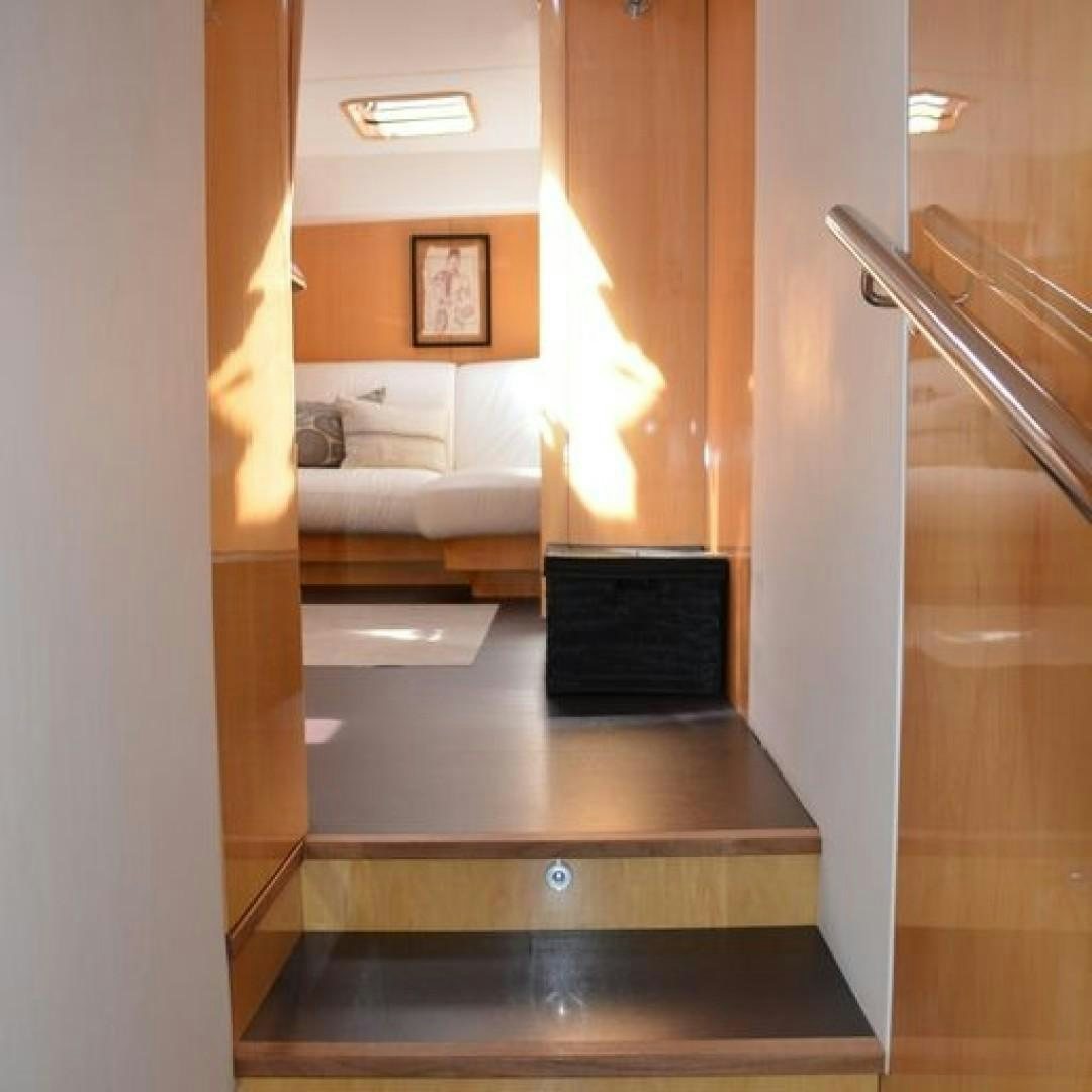 a room with a laptop and a bed aboard MATAU Yacht for Sale